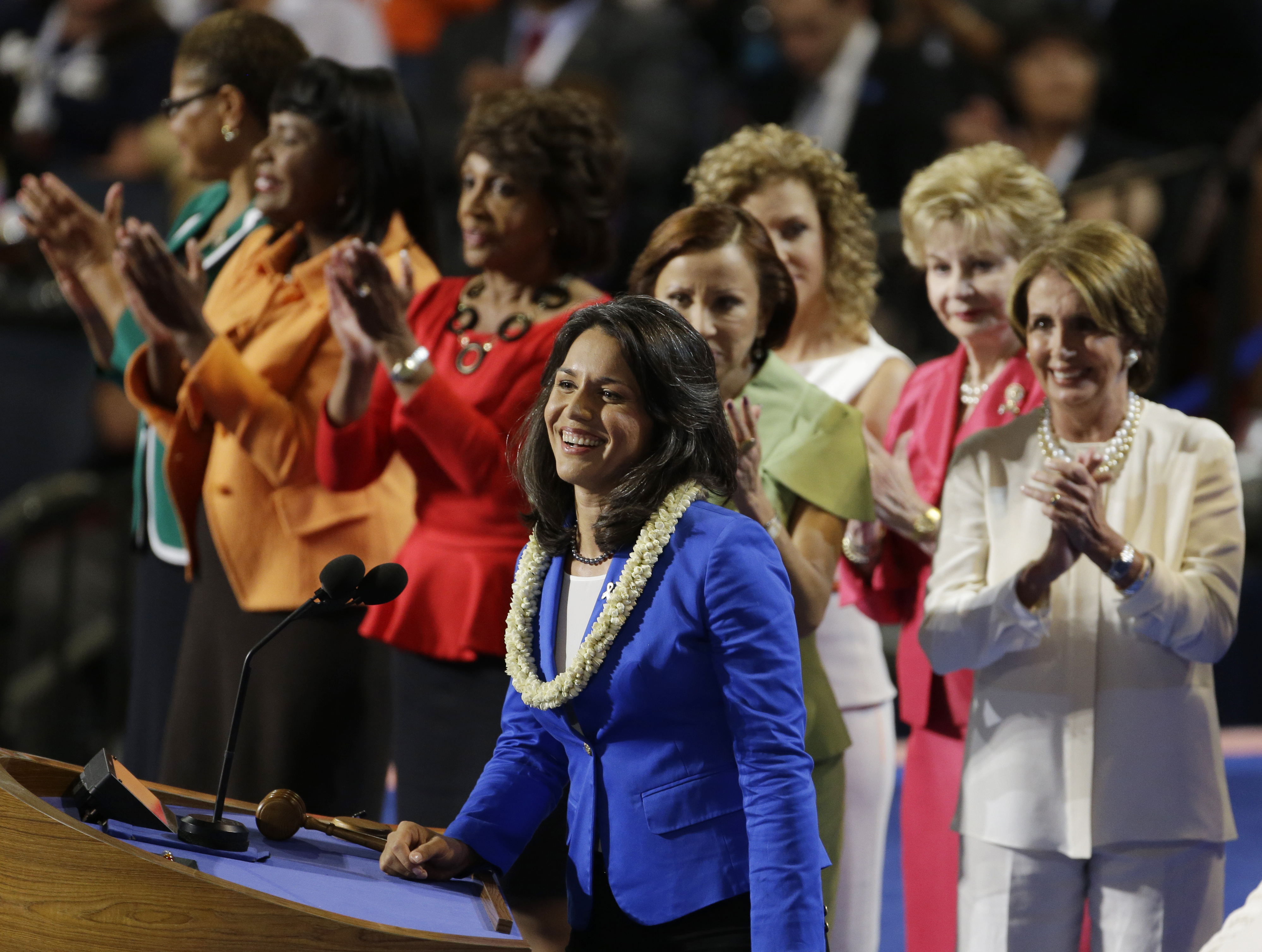Hawaii House candidate Tulsi Gabbard is applauded by women House members at the 2012 Democratic National Convention in Charlotte, N.C. (Lynne Sladky—AP)