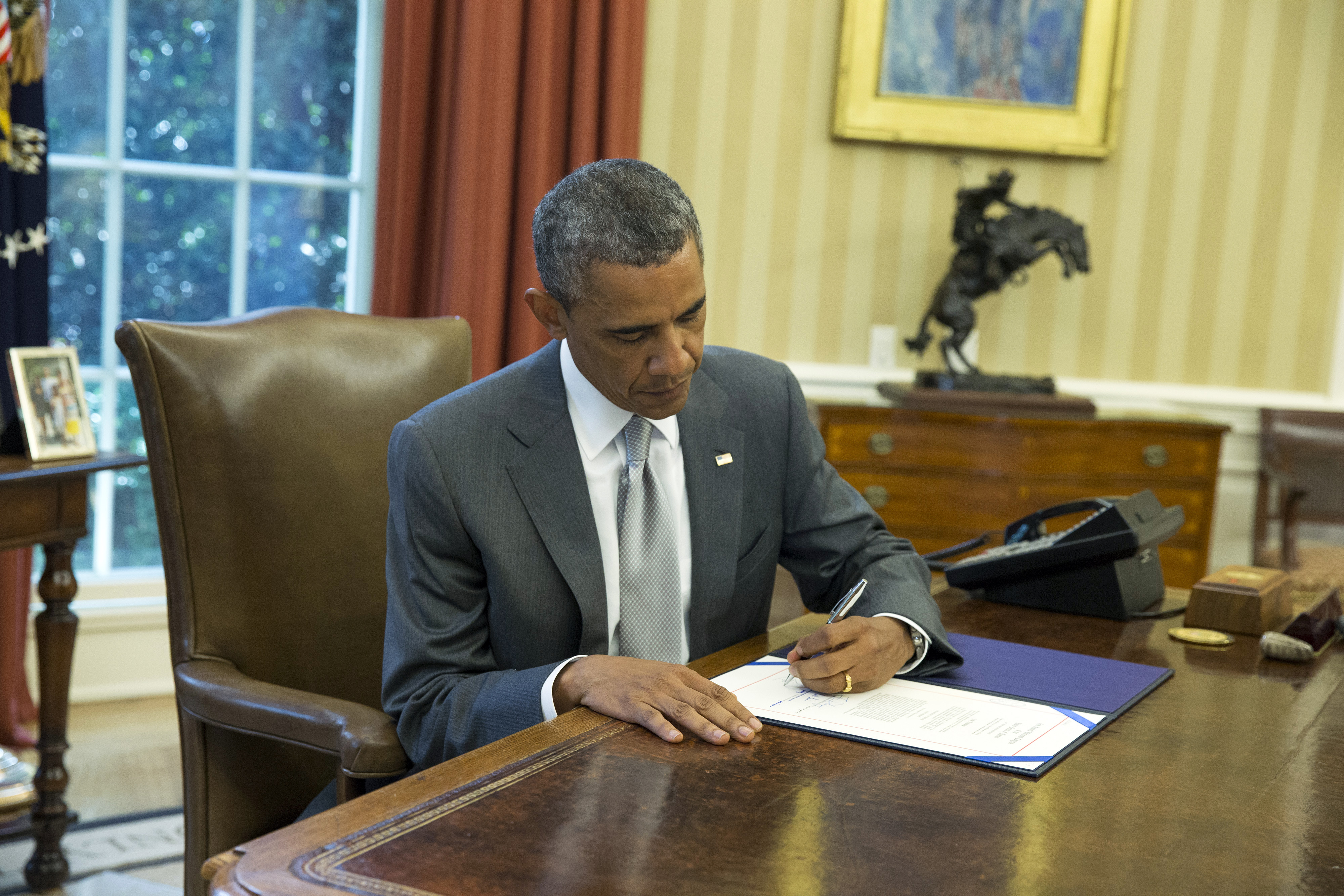 President Barack Obama signs 