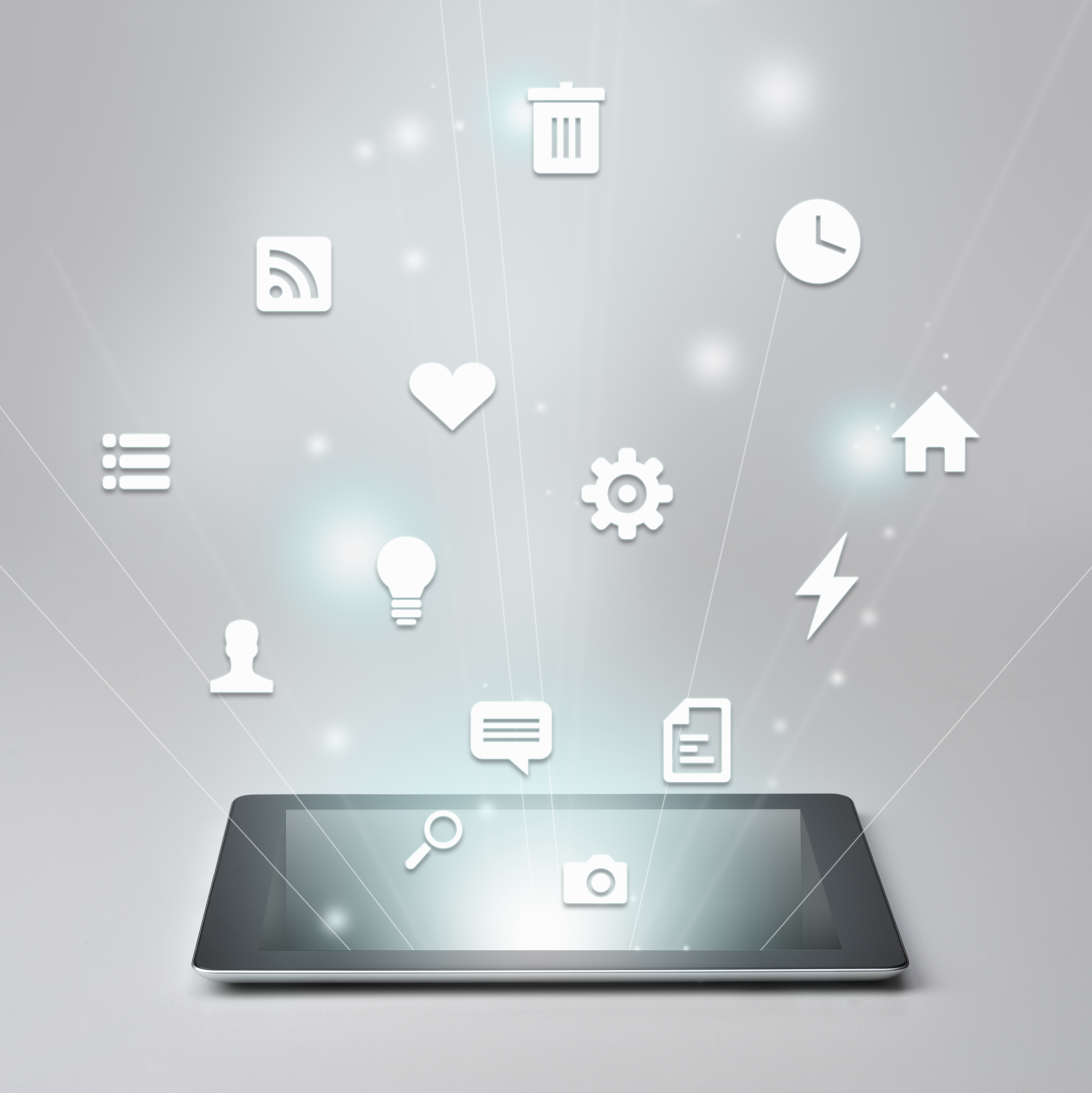 Digital tablet and Variety of icons (Yagi Studio—Getty Images)