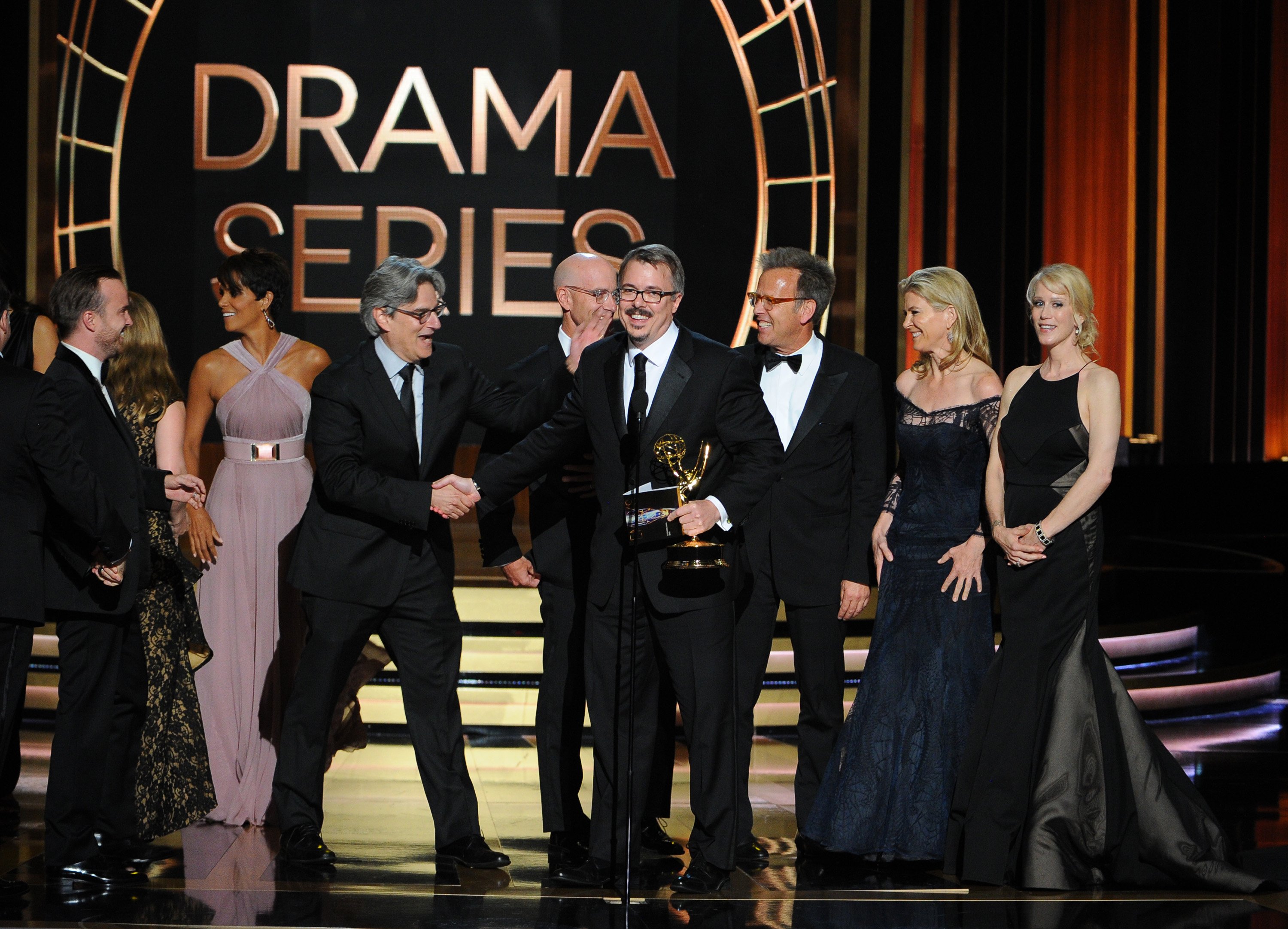 Vince Gilligan, center, and the cast and producers of Breaking Bad accept the award for outstanding drama series at the 66th Primetime Emmy Awards at the Nokia Theatre L.A. Live on Monday, Aug. 25, 2014, in Los Angeles. (Vince Bucci—Invision/AP)