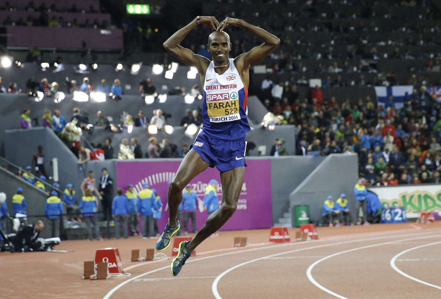 Britain's Mo Farah dances as he celebrates winning the gold medal in the men's 10,000m final during the European Athletics Championships in Zurich on August 13, 2014.