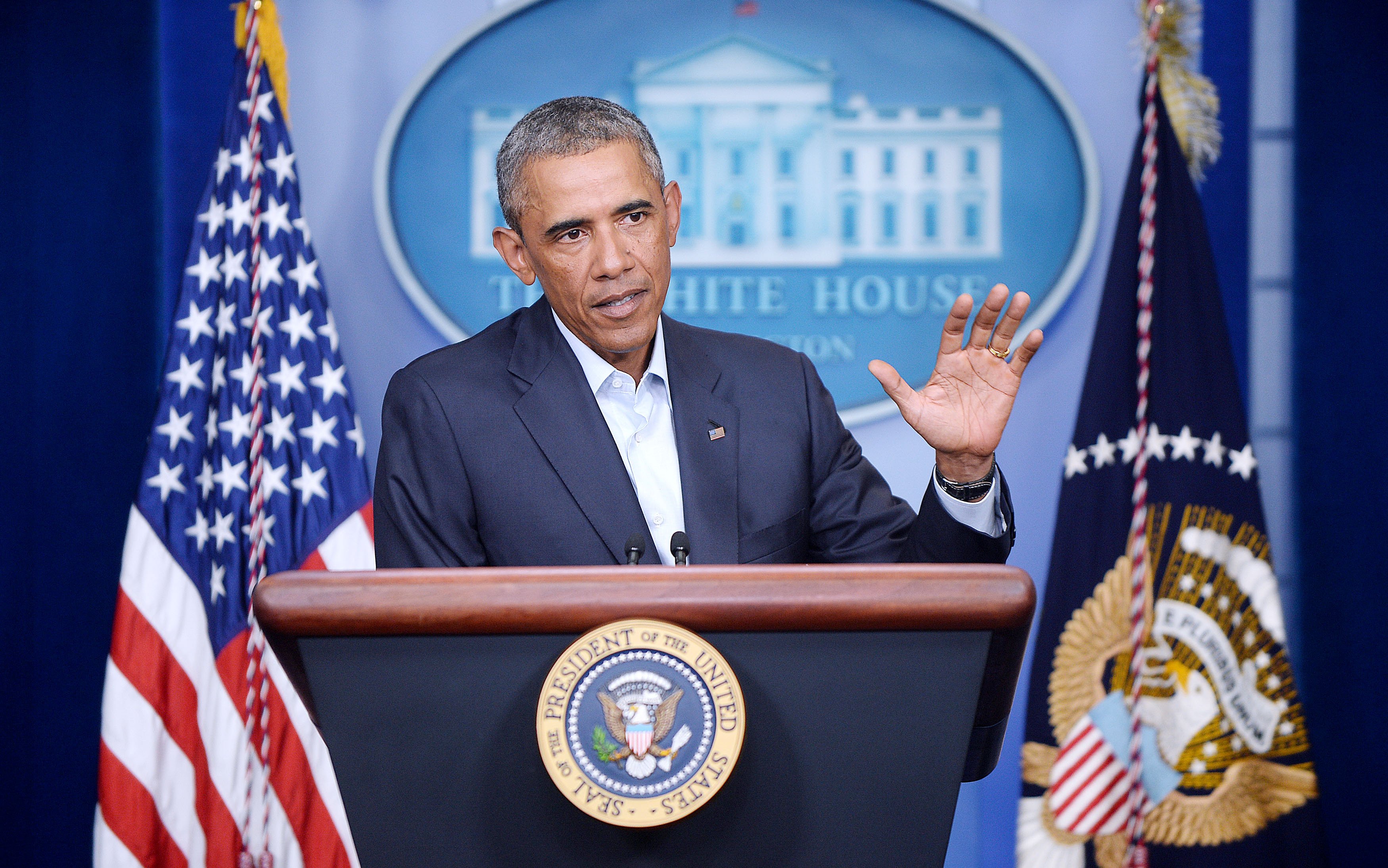 President Obama delivers a statement to provide an update on Iraq and the situation in Ferguson, Missouri - DC