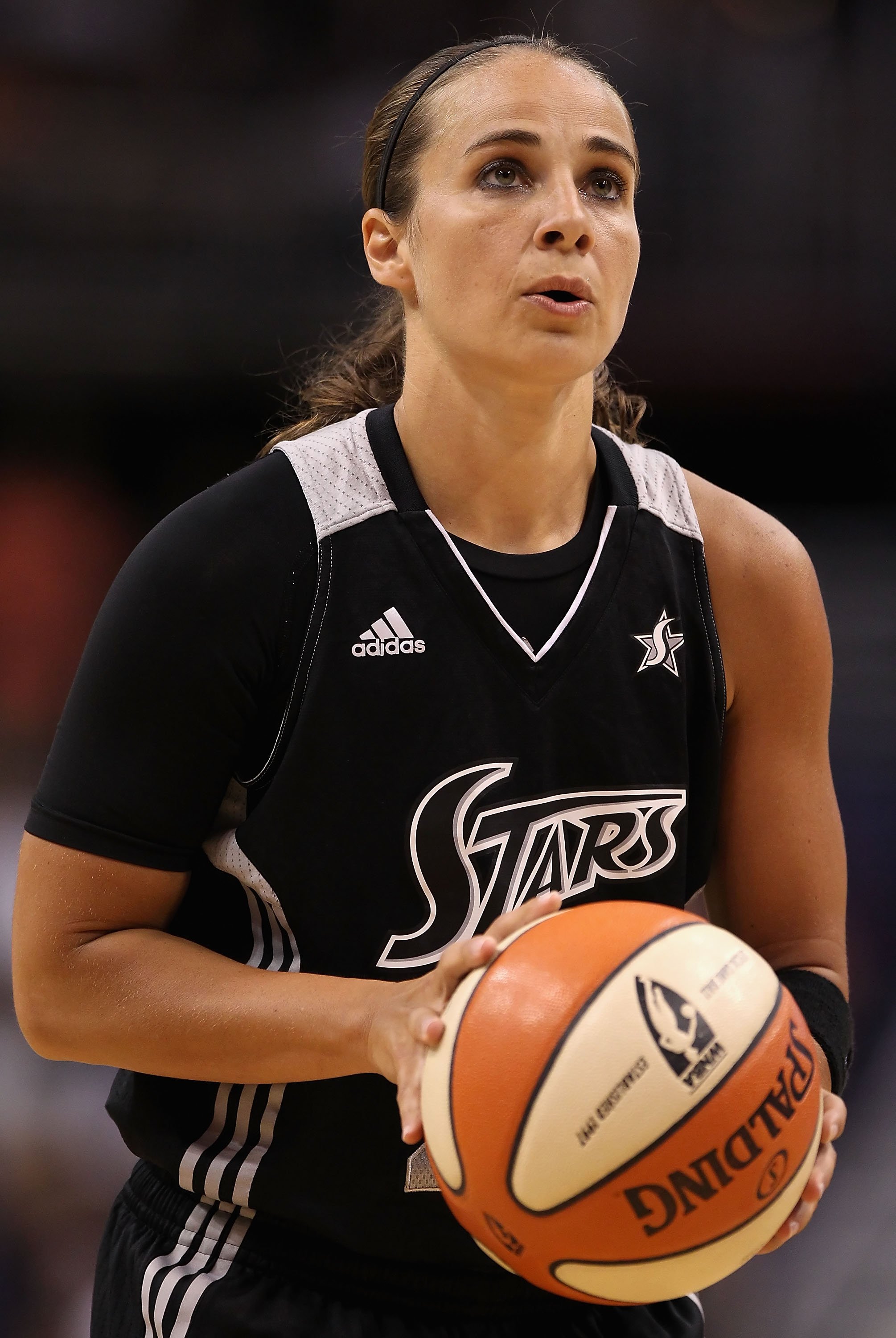 Becky Hammon #25 of the San Antonio Silver Stars shoots a free throw shot during the WNBA game against the Phoenix Mercury at US Airways Center on August 20, 2011 in Phoenix, Arizona. The Mercury defeated the Silver Stars 87-81.  NOTE TO USER: User expressly acknowledges and agrees that, by downloading and or using this photograph, User is consenting to the terms and conditions of the Getty Images License Agreement.  (Photo by Christian Petersen/Getty Images) (Christian Petersen—Getty Images)