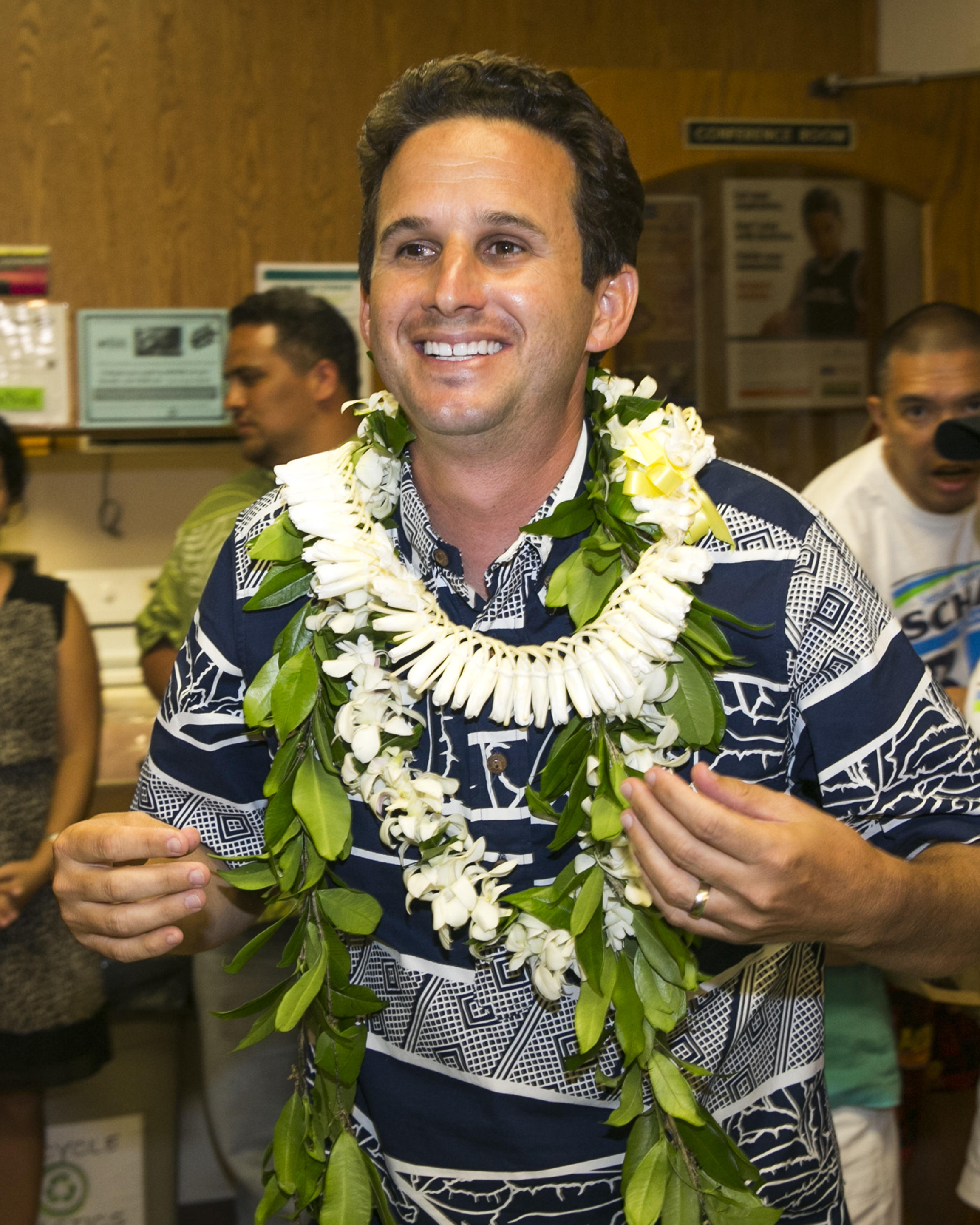US Sen. Brian Schatz celebrates after defeating fellow Democrat Colleen Hanabusa to retain his senate seat on Aug. 15, 2014 in Hilo, Hawaii. (Marco Garcia—AP)