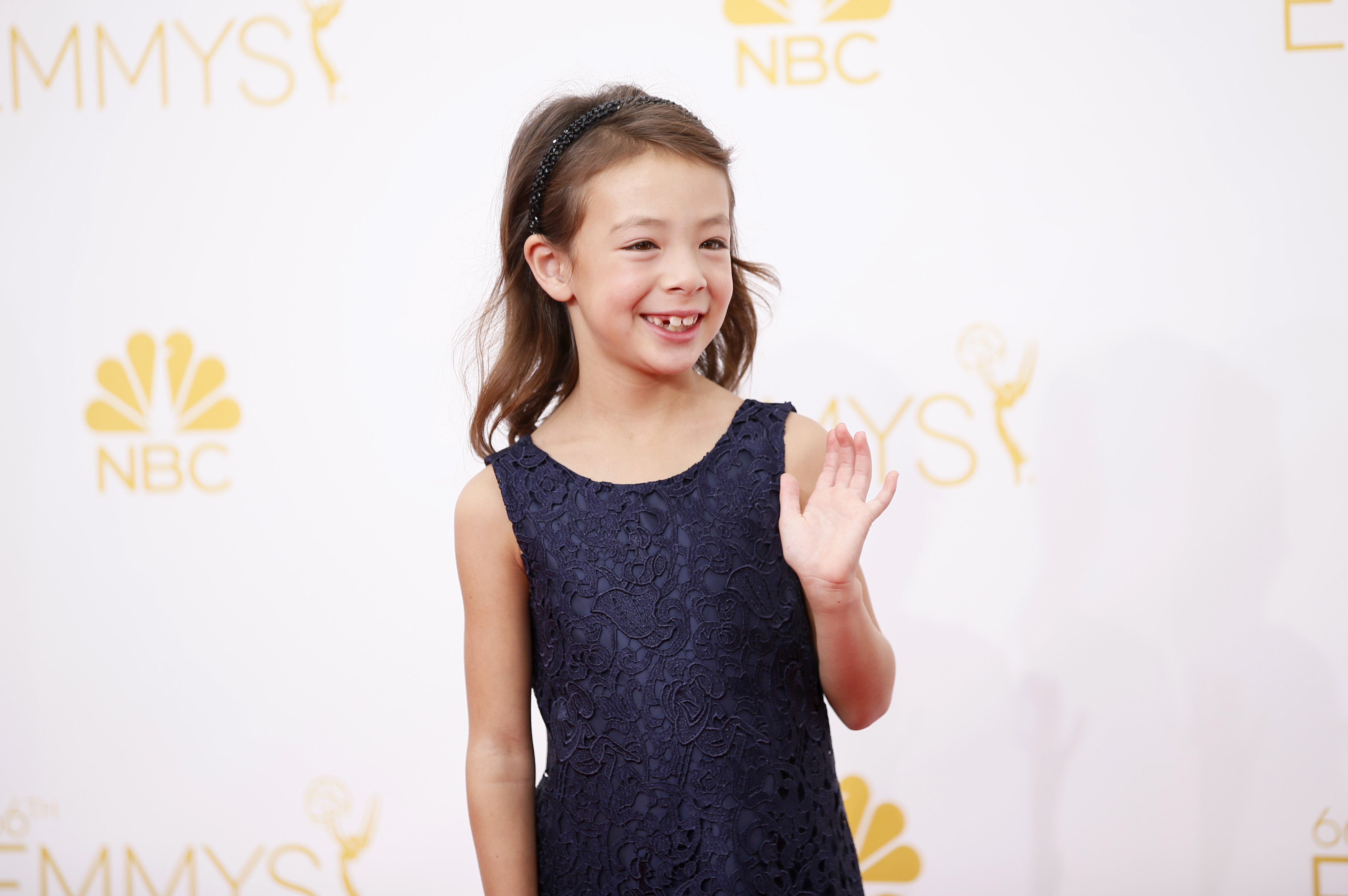 Aubrey Anderson-Emmons arrives at the 66th Primetime Emmy Awards at the Nokia Theatre L.A. Live on Monday, Aug. 25, 2014, in Los Angeles.
