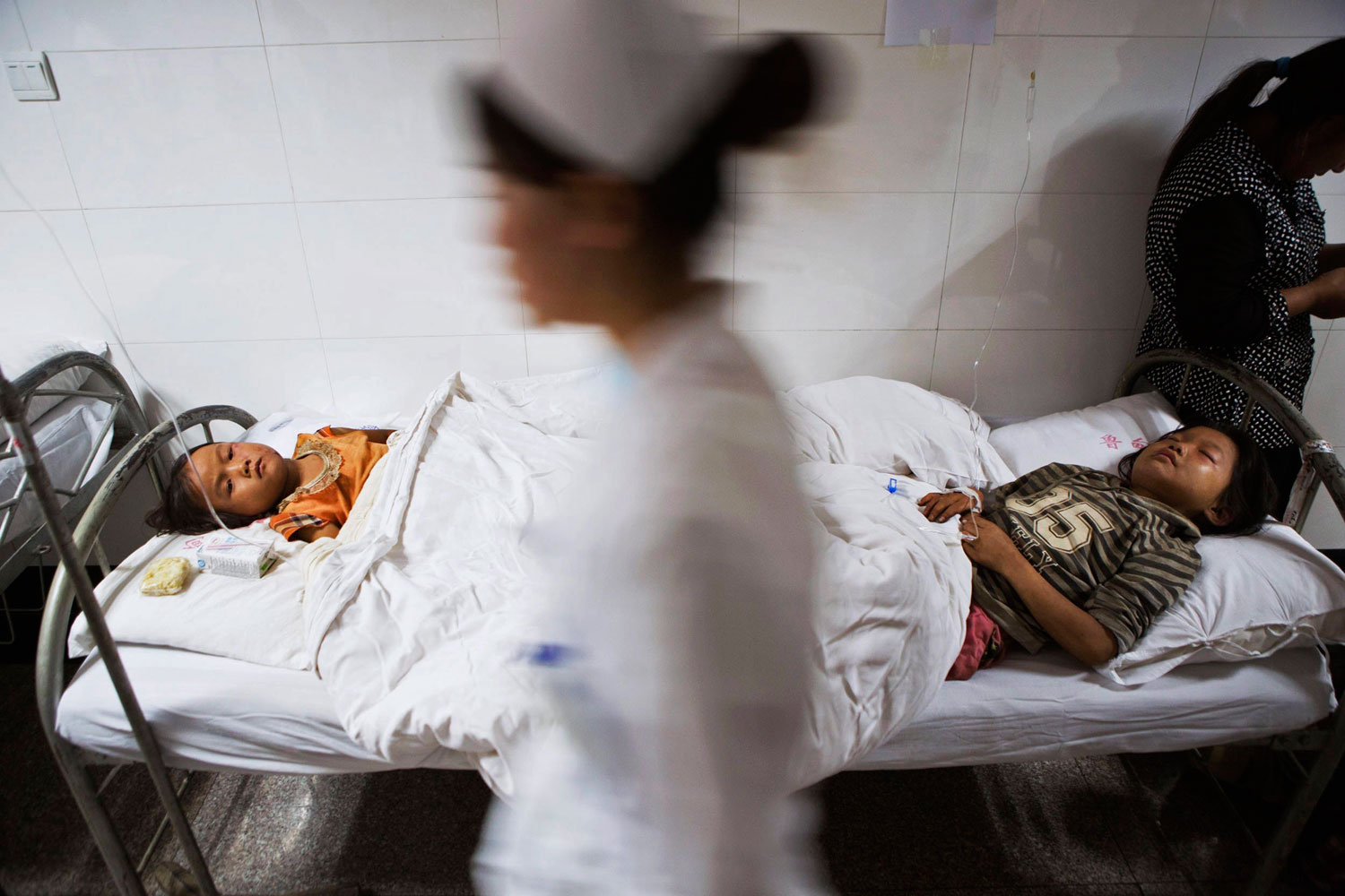 Children are treated at a hospital in Ludian county, after a magnitude 6.3 earthquake hit Zhaotong, Yunnan province on Aug. 3, 2014.