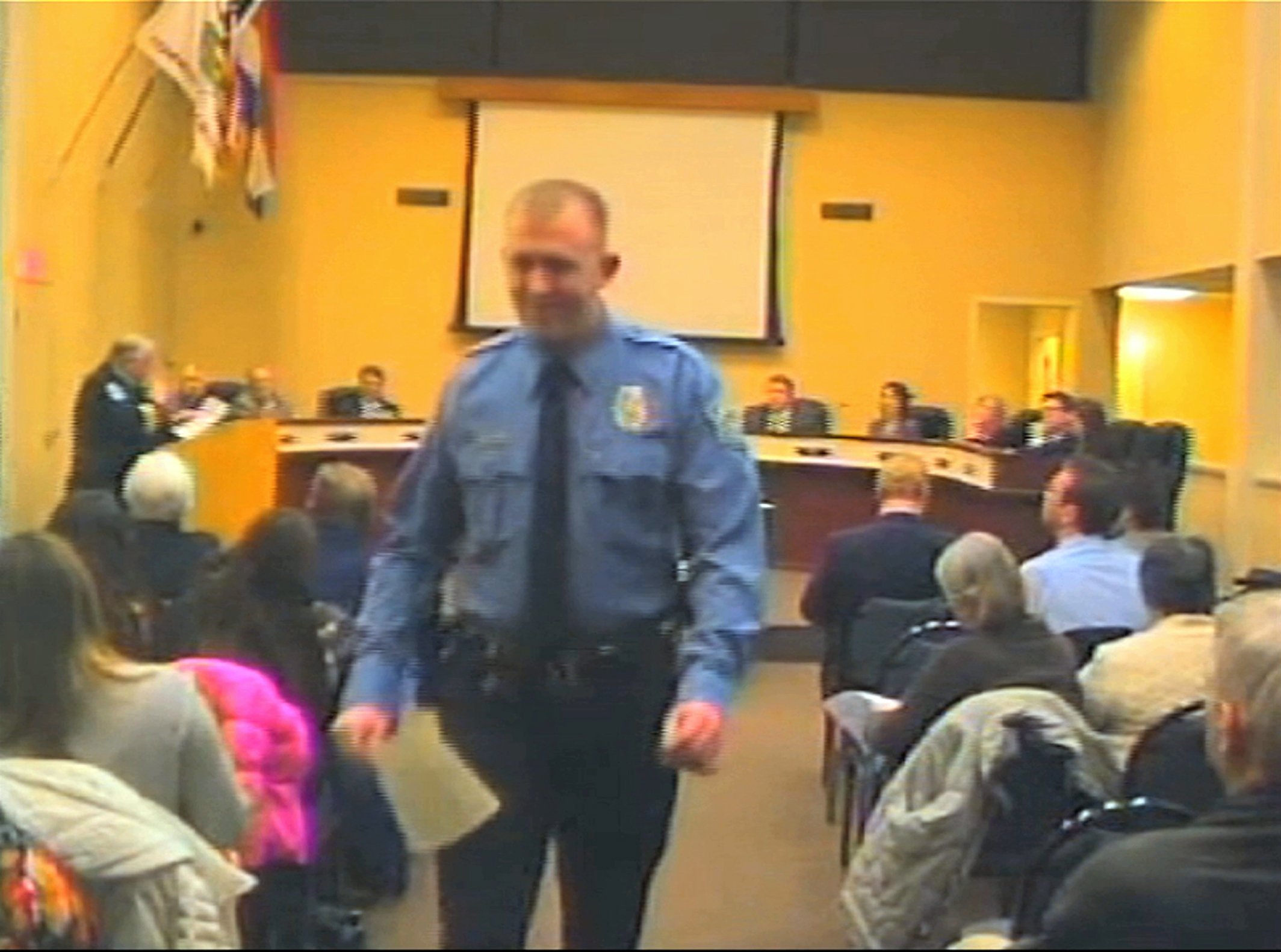 Officer Darren Wilson attends a city council meeting in Ferguson on Feb. 11, 2014 in this image released from video by the City of Ferguson, Mo. (AP)
