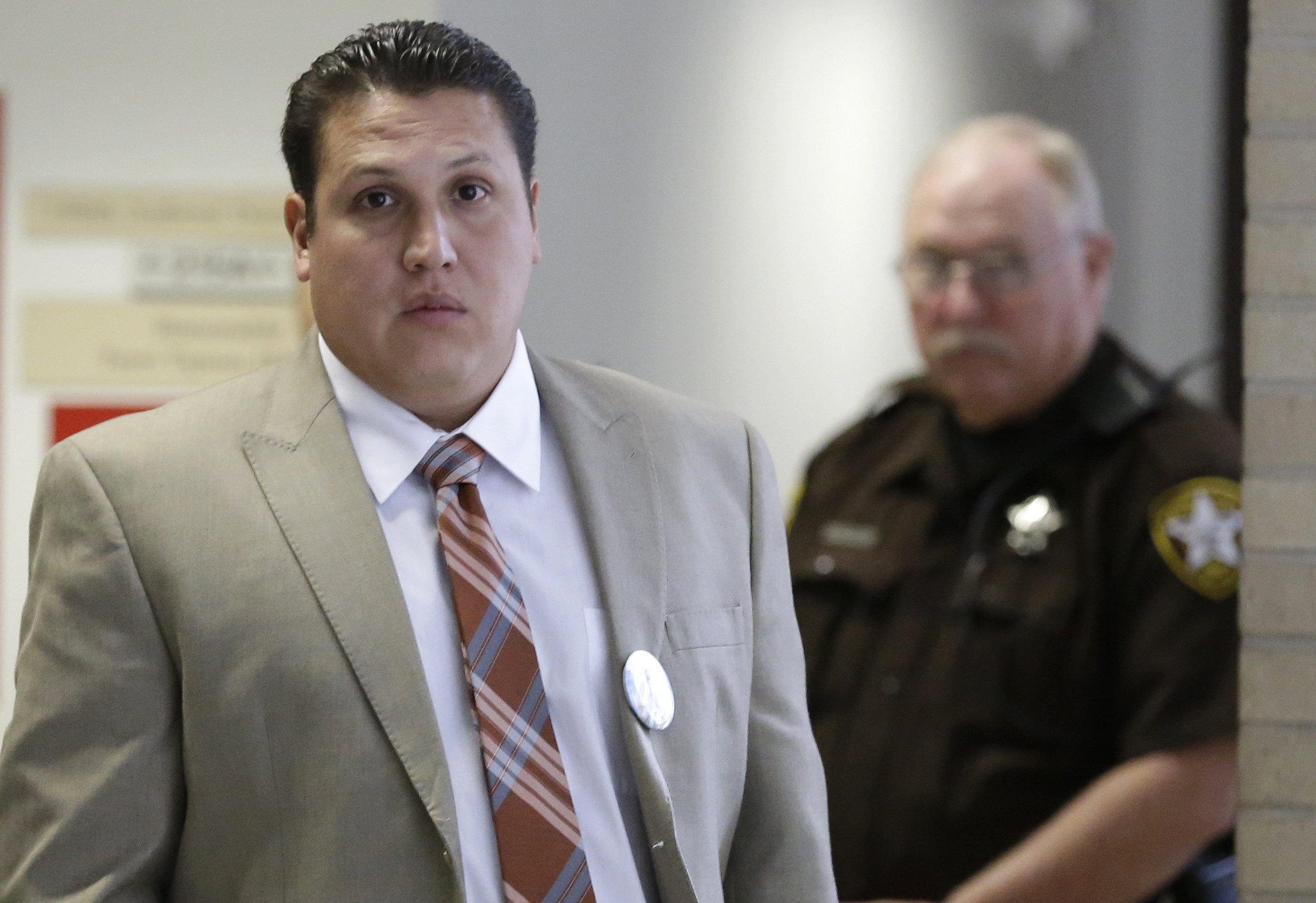David Barajas leaves the courtroom during a break in his murder trial Aug. 20, 2014, in Angleton, Texas. B (Pat Sullivan—AP)