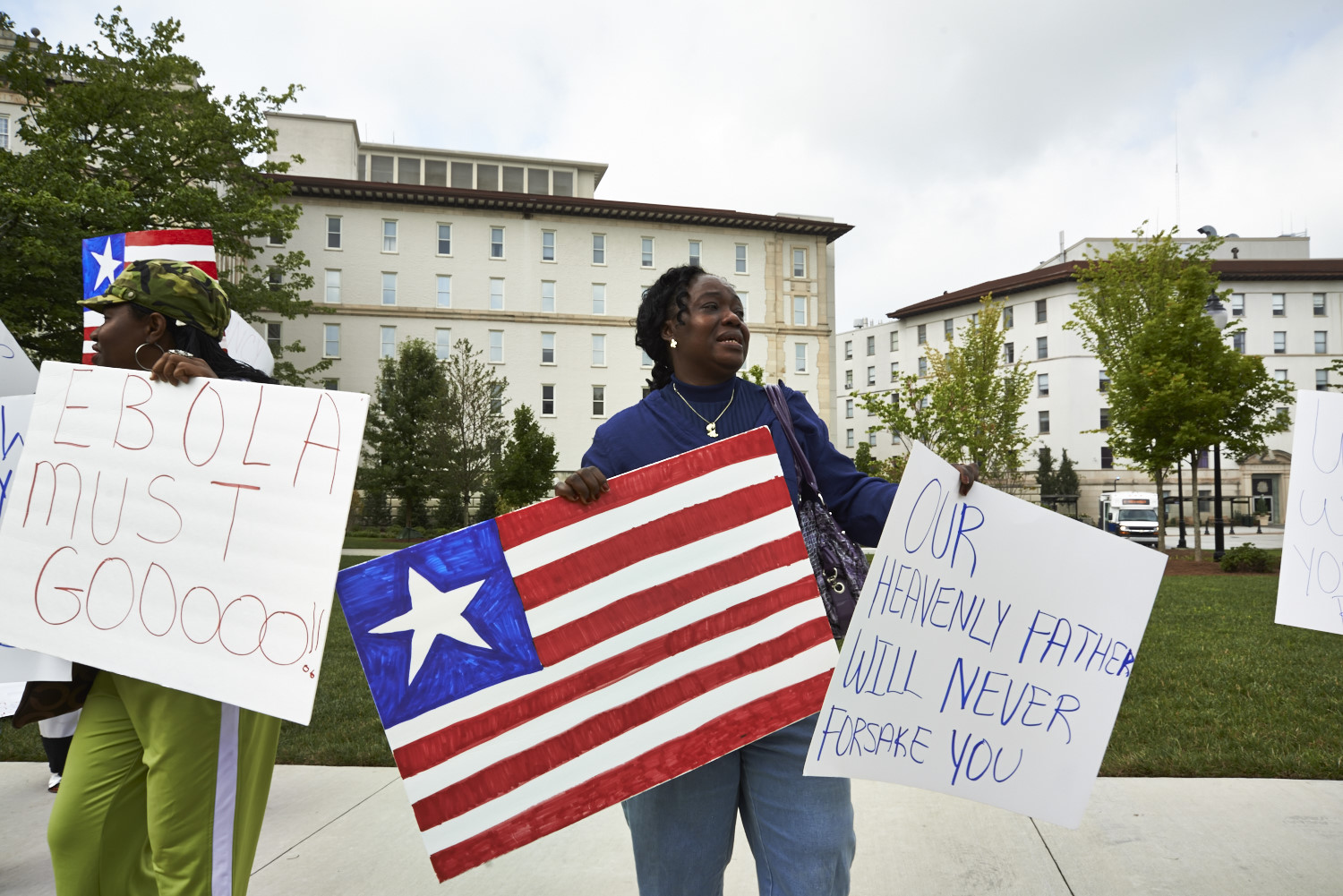 Garmai Kpardeh, a member of the Liberian Association of Metropolitan Atlanta rallying in front of Emory University Hospital, August 9. (Spencer Lowell for TIME)