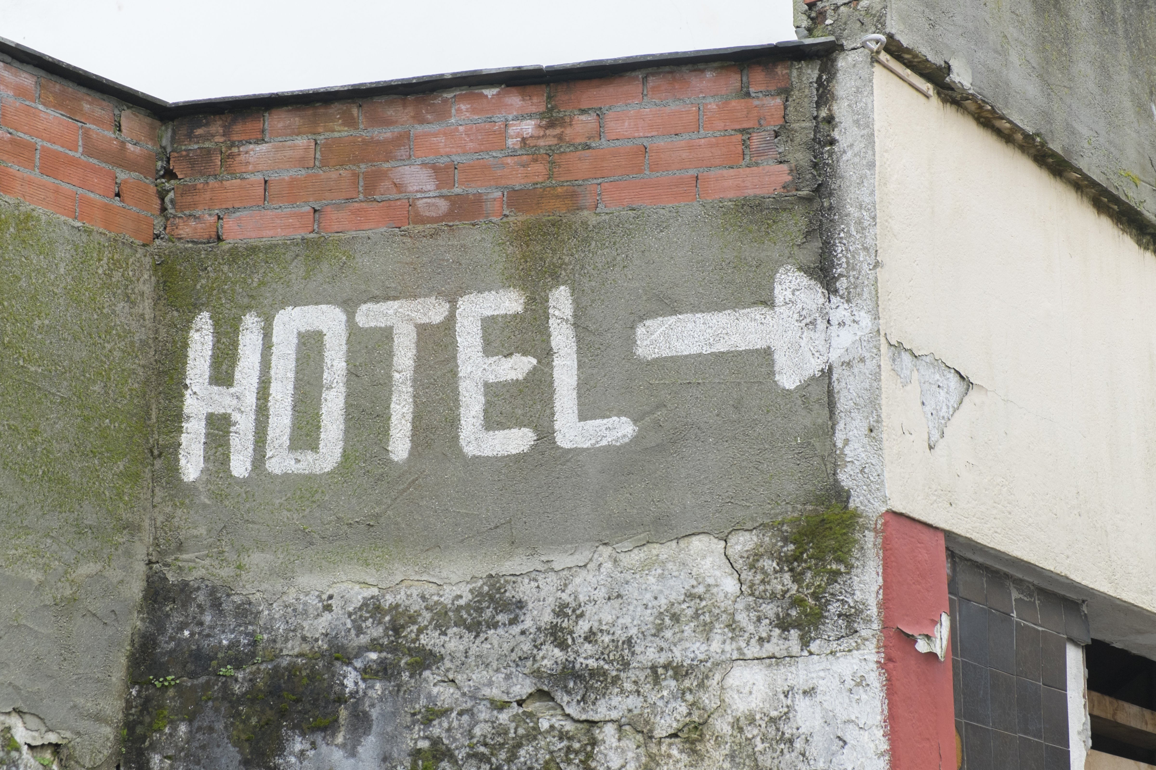 Painted sign indicatiing an hotel
