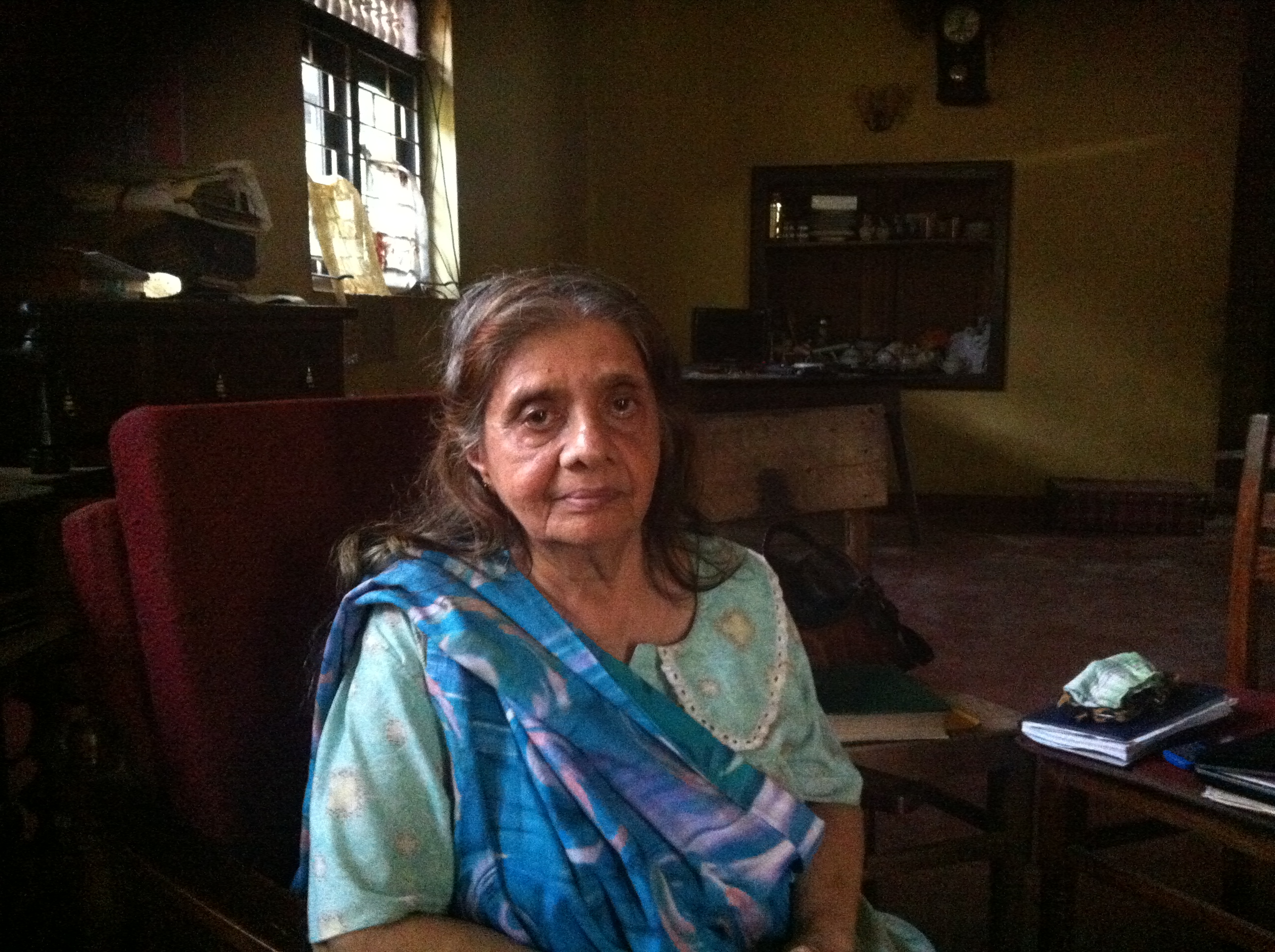 Nafeesathiek Thahira Sahabdeen, 68, at her ransacked home in Dharga Town, Sri Lanka. (Charlie Campbell)