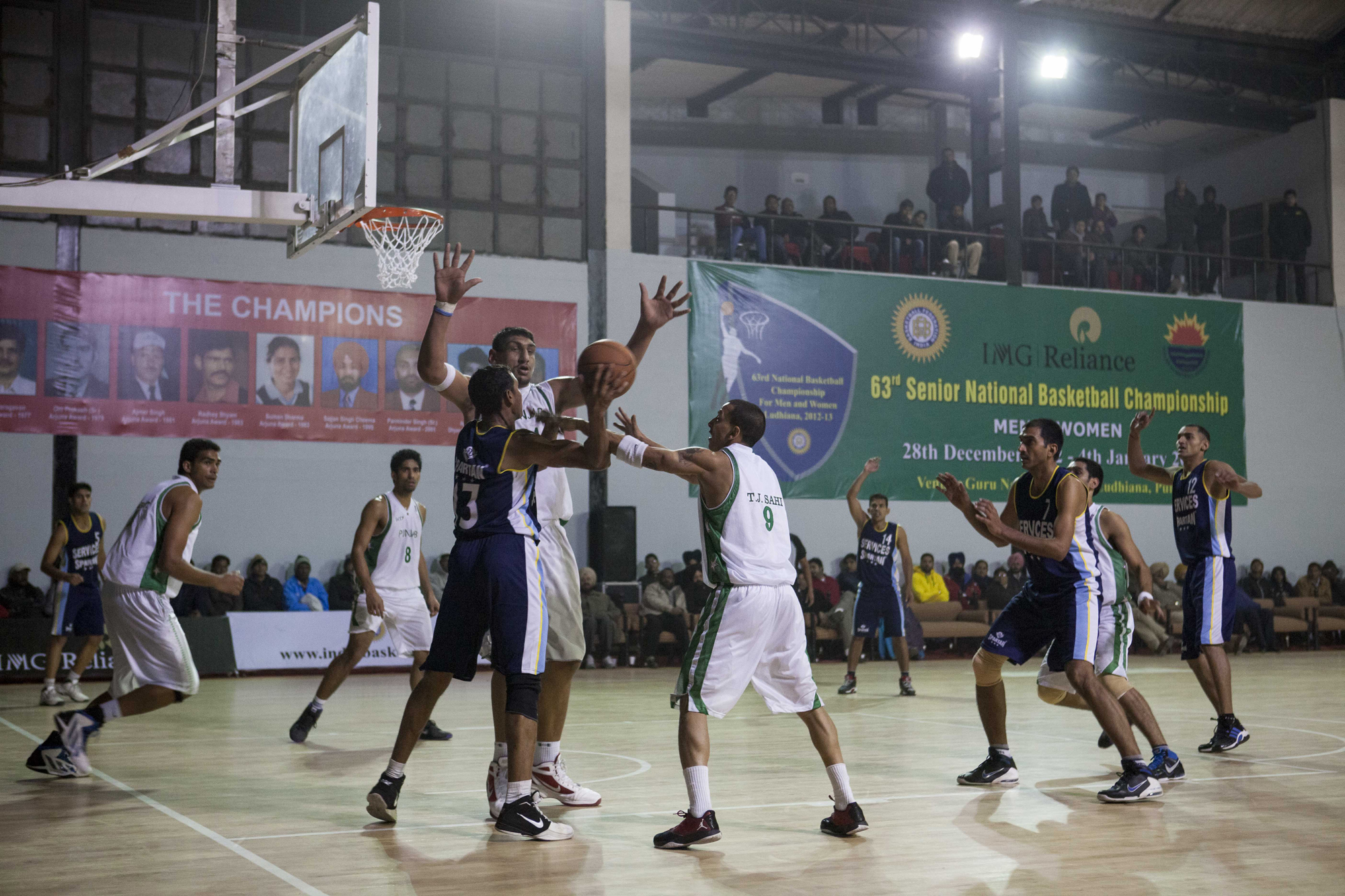 Satnam Singh defending the basket, Punjab team vs Services, 63rd Senior National Basketball Championship for Men and Women Ludhiana, 2012.
