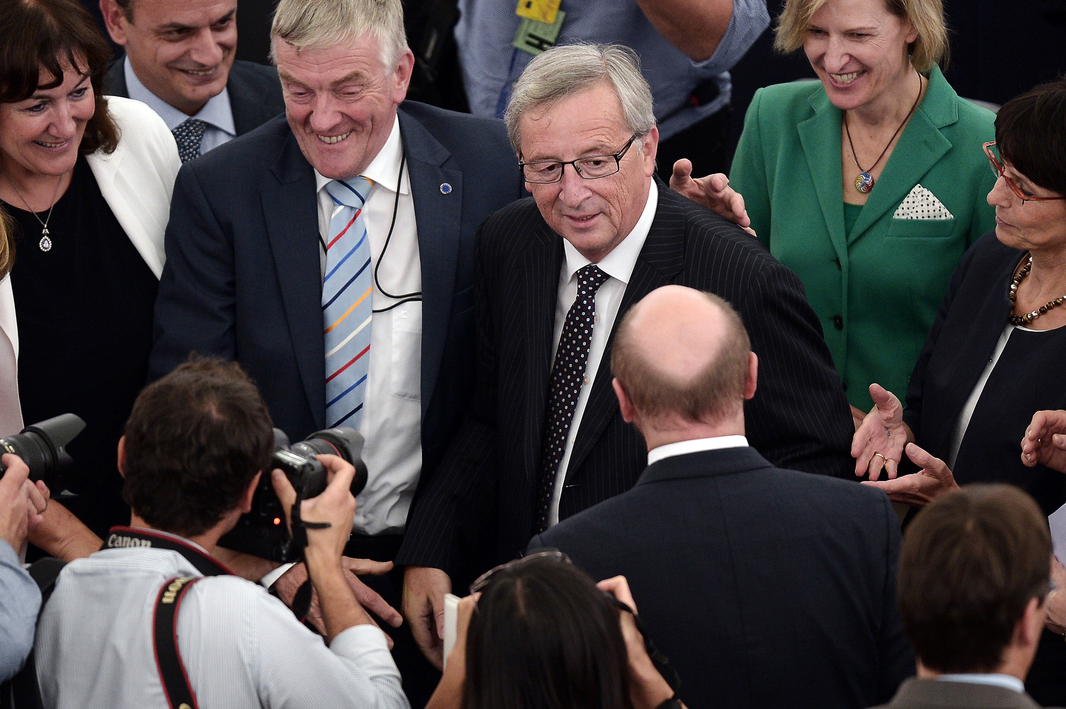 Newly elected President of the European Commission, Jean-Claude Juncker is congratulated on July 15, 2014, in the European Parliament in Strasbourg, France.