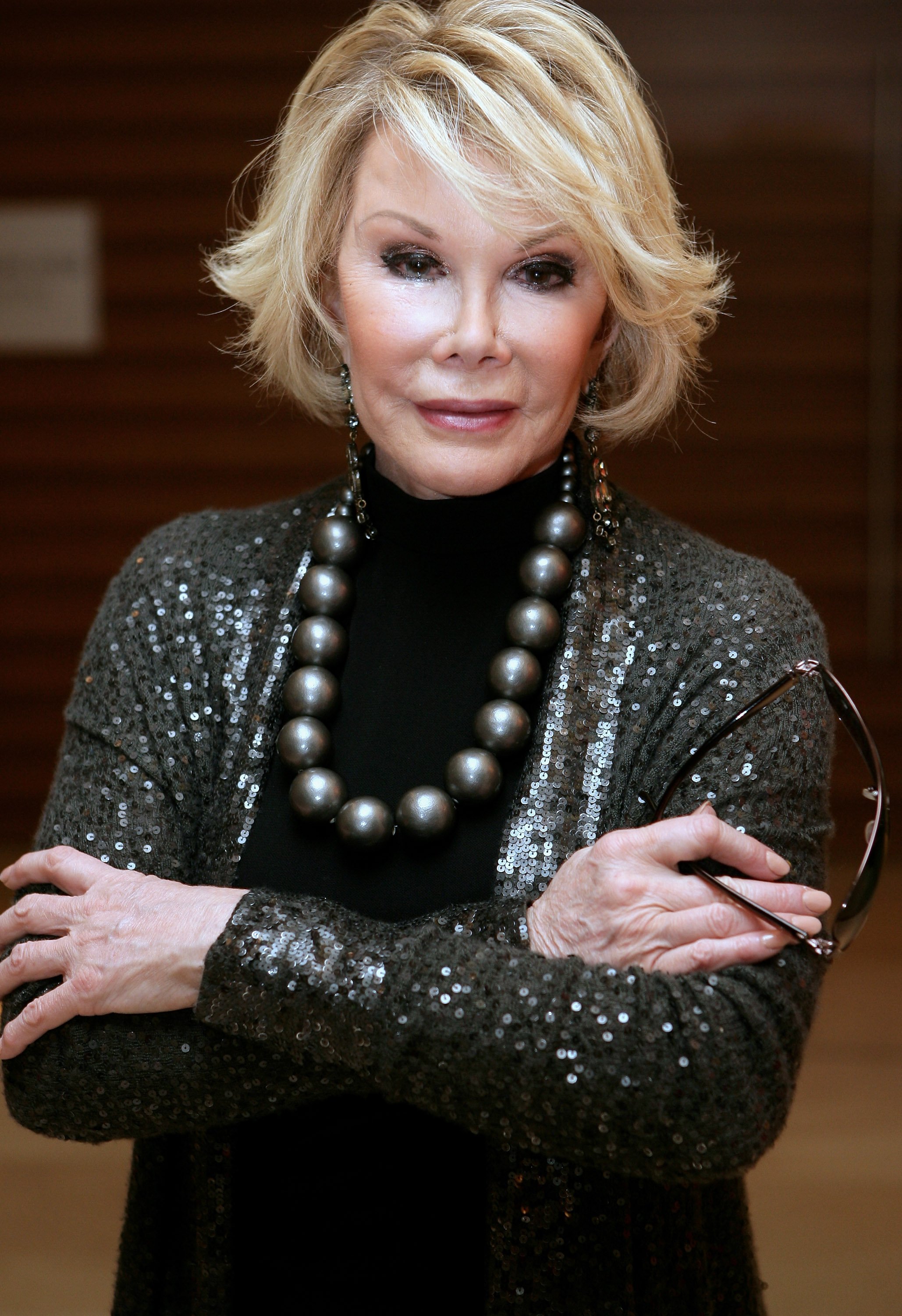 FILE  Comedian Joan Rivers Hospitalised After She Stops Breathing Following An Operation On Her Vocal Chords