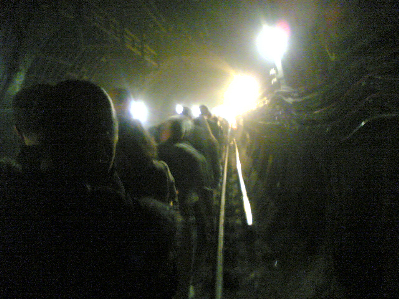 Photograph taken by commuter Alexander Chadwick, taken on his mobile phone camera, shows passengers evacuating from an underground train in a tunnel near Kings Cross station after the London bombings. London. July 7, 2005.