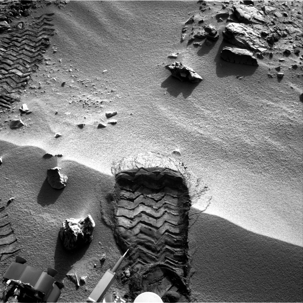 NASA's Mars rover Curiosity cut a wheel scuff mark into a wind-formed ripple at the "Rocknest" site to examine the particle-size of the ripple. For scale, the width of the wheel track is about 16 inches (40 centimeters).