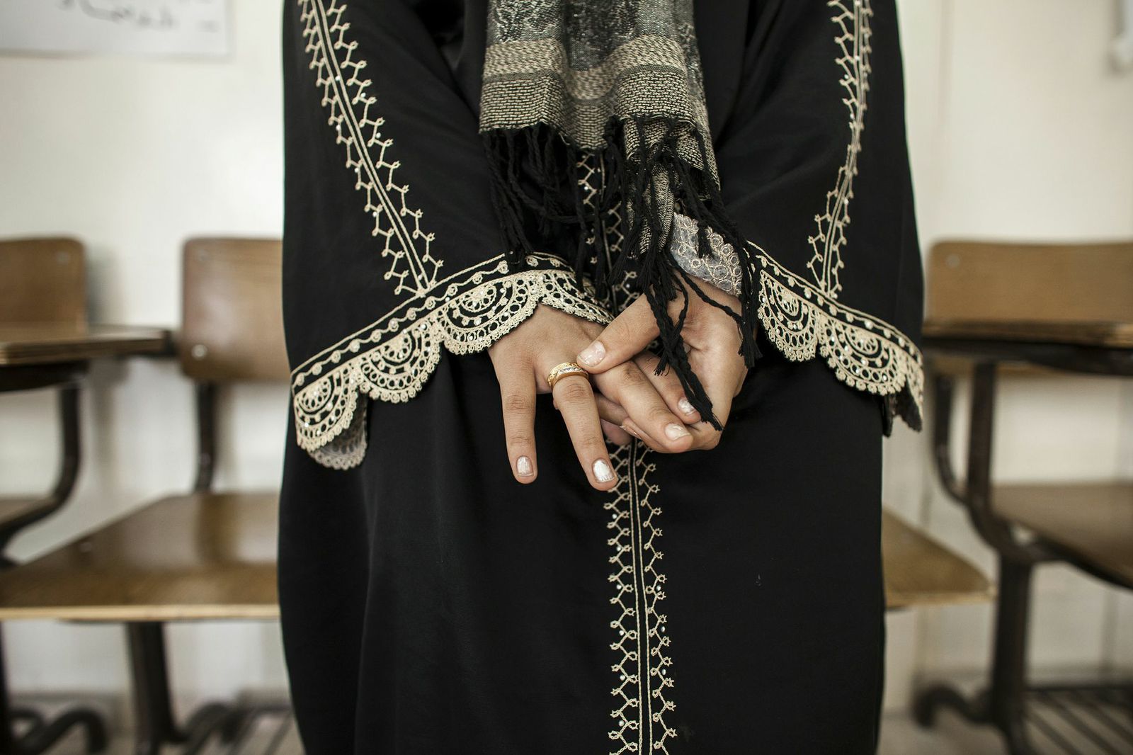 A Jordanian student shows off her engagement ring at the Social Support Center, an NGO which provides classes for dropout students, in Amman May 2012.