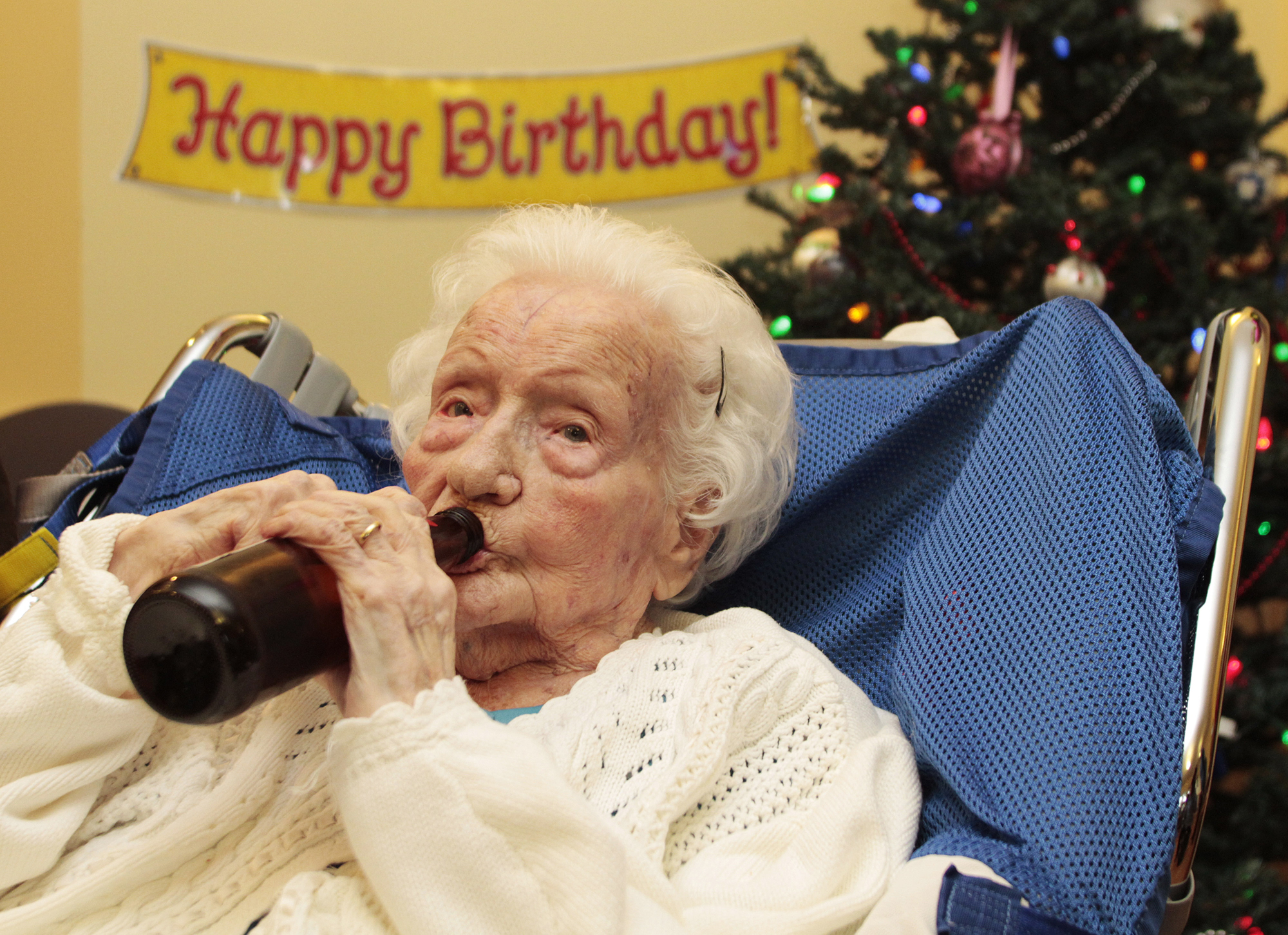 Merle Barwis, 111 years old enjoys a birthday beer with family in Victoria, B.C. December 23, 2011.