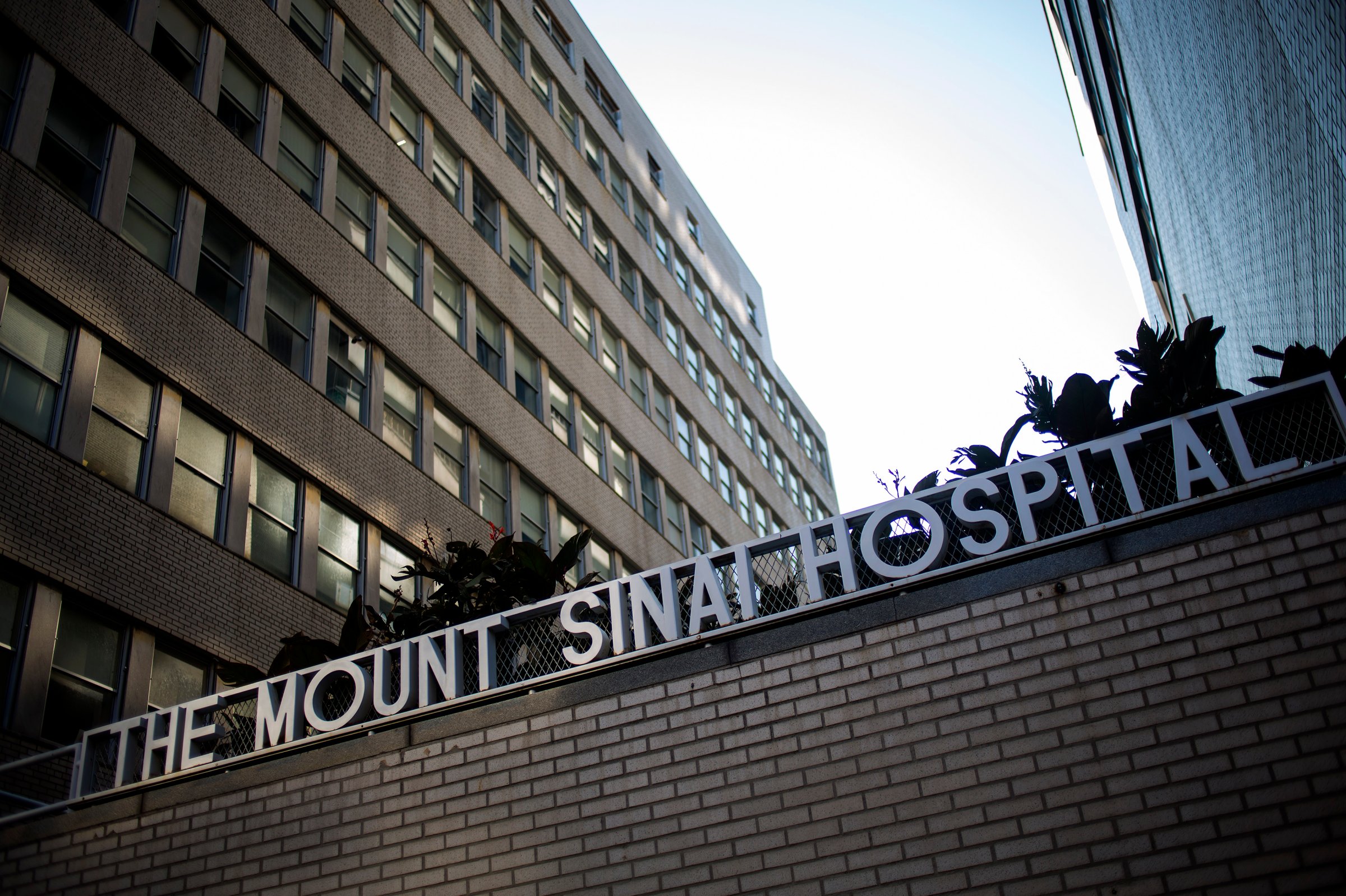 Signage hangs outside Mount Sinai Hospital on August 4, 2014 in New York City.