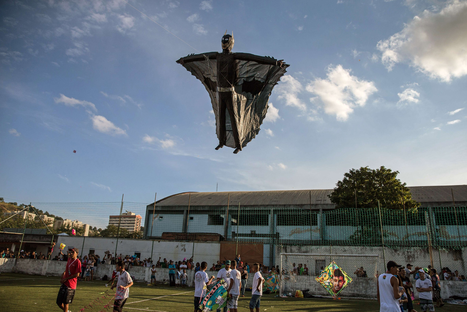 View of a Batman-shaped kite during the 30th kite-flying festival in Sao Goncalo, a surburb of Rio de Janeiro on Aug. 17, 2014.