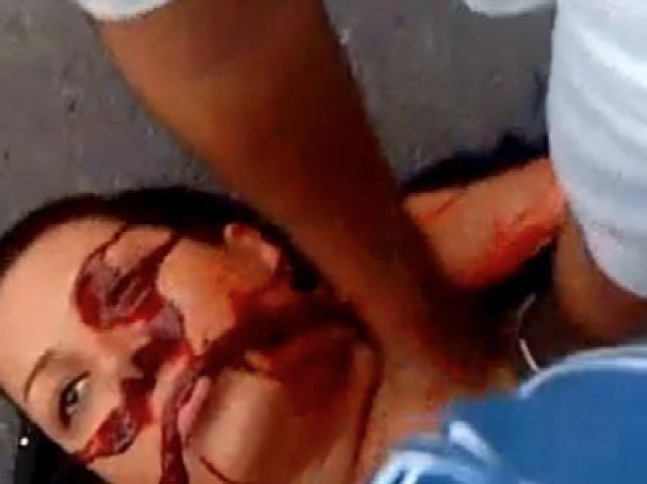 A frame grab from a video posted on YouTube in June 2009 during the post-election uprising in Iran,shows a woman identified as Neda Agha-Soltan lying on the ground after being shot in the chest.