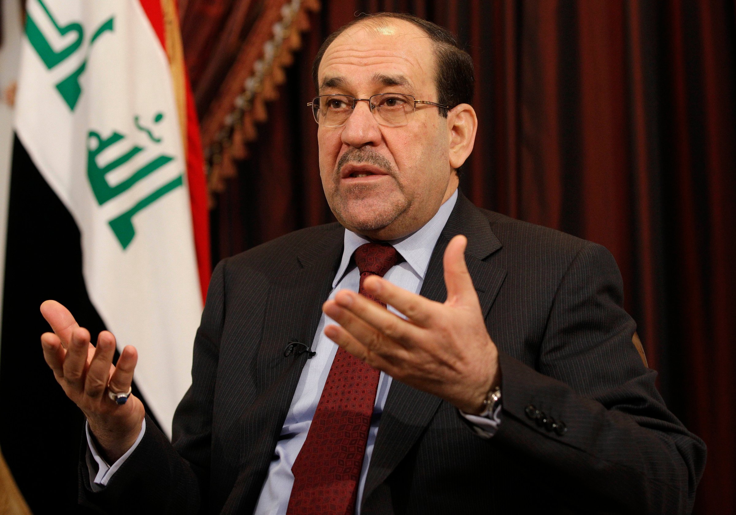 Iraq's Prime Minister Nouri al-Maliki speaks during an interview with The Associated Press in Baghdad, Iraq on December 3, 2011.
