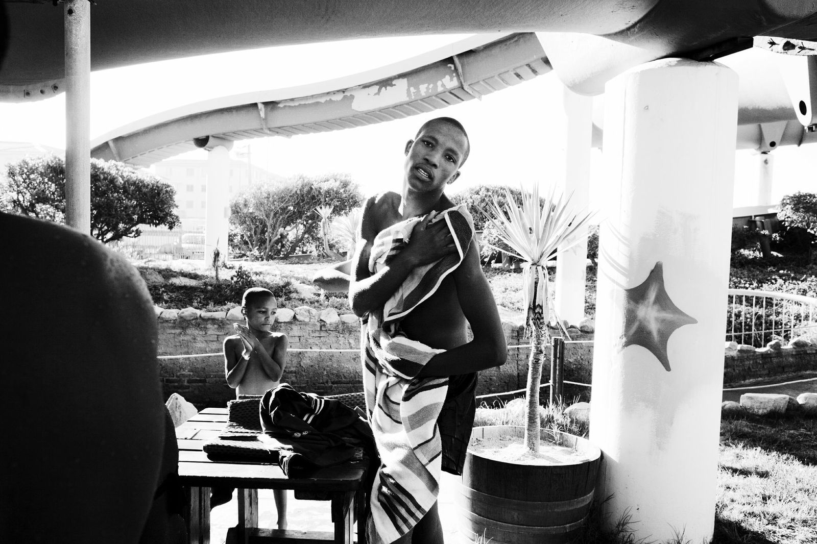 Nkosinathi Dodi, 18, from Khayelitsha, at the Muizenberg water park during a field trip with the Beth Uriel home for disadvantaged young men, in Cape Town. His stay at the home was brief.  He lives in an old abandoned building now, but I see him at church,  says the program director Lindsay Henley.