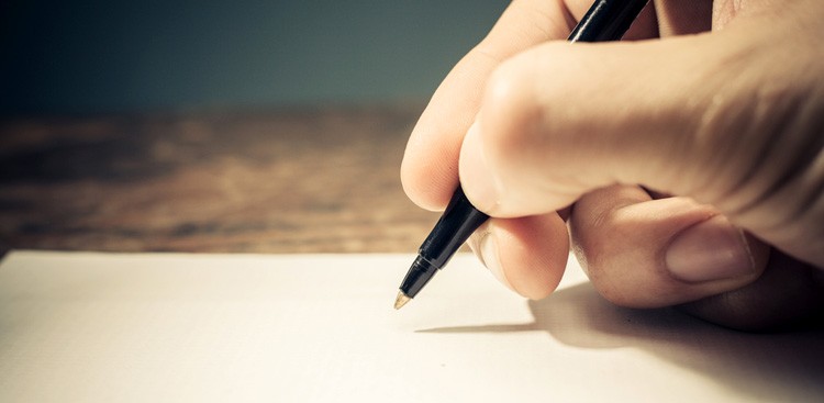person writing-hand-pen-themuse