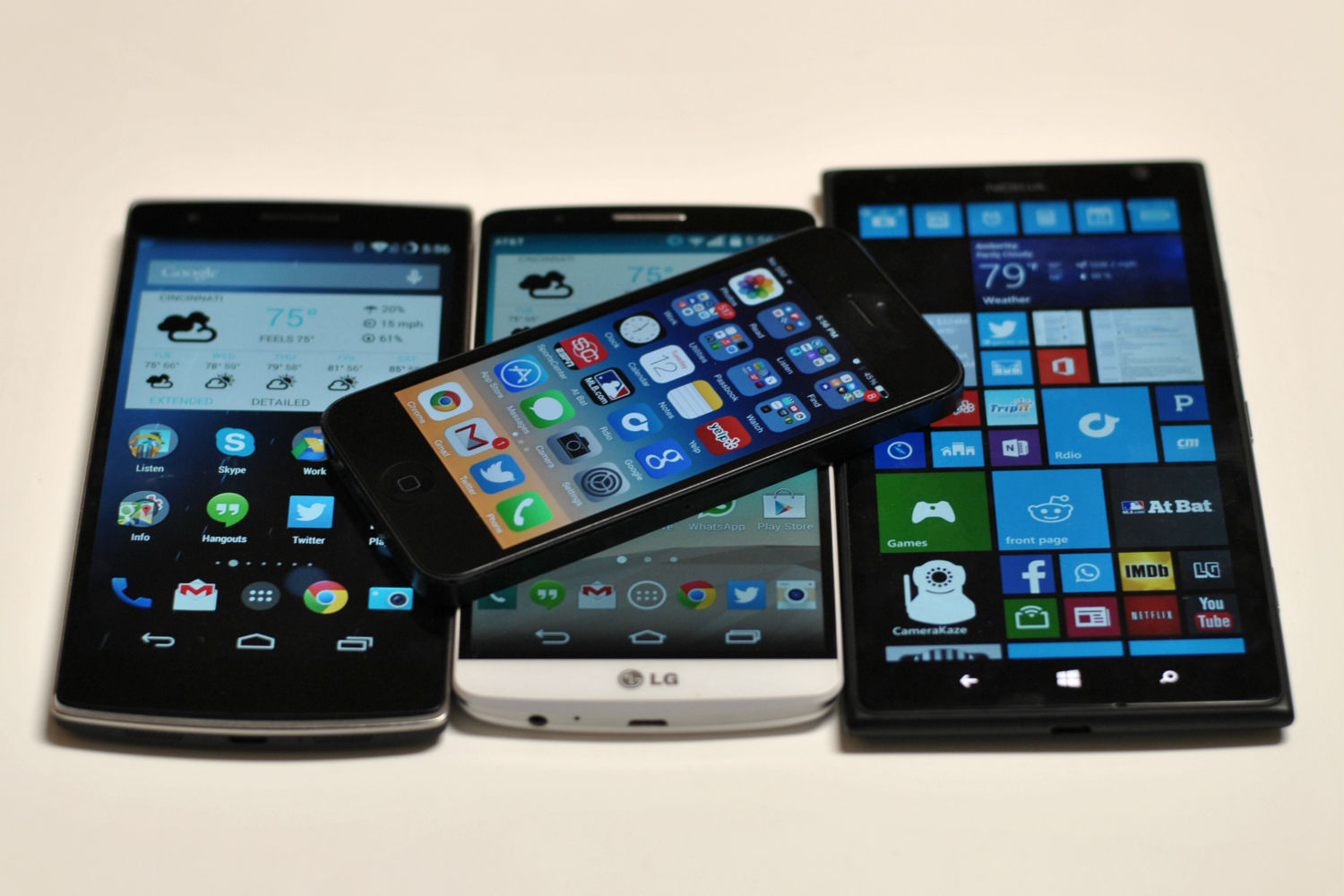Left to right: OnePlus One, Apple iPhone (above), LG G3, Nokia Lumia 1520 (Jared Newman for TIME)