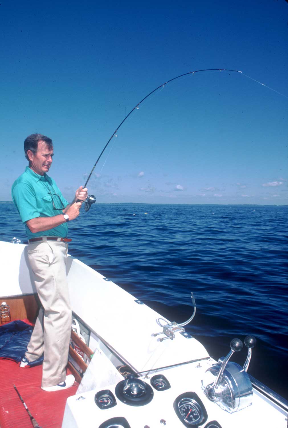 Vice President George Bush tries to catch a fish in August, 1983 in Kennebunkport, Maine. The small town would sometimes be clogged with traffic when Bush, as Vice President and later as President, would visit, reporters in tow.