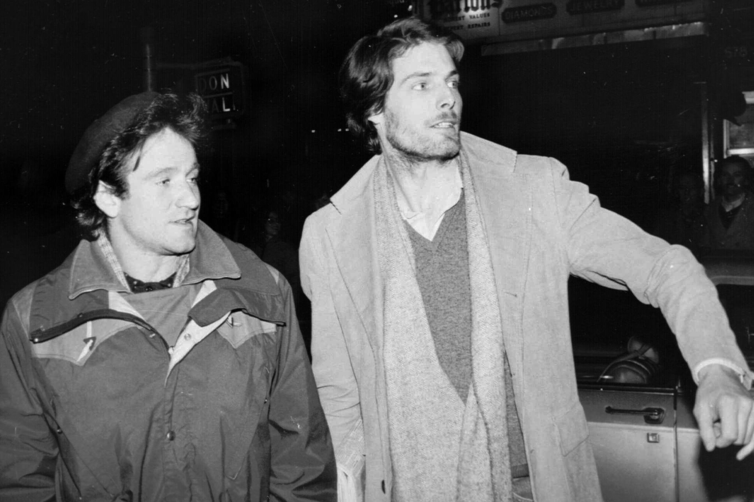 Robin Williams, left, and Christopher Reeve, attempt to hail a taxicab in New York City on Feb. 9, 1981. Williams went to see Reeve, who is appearing in the play "The Fifth of July", backstage after his performance Friday night. (Steve Sands – AP)