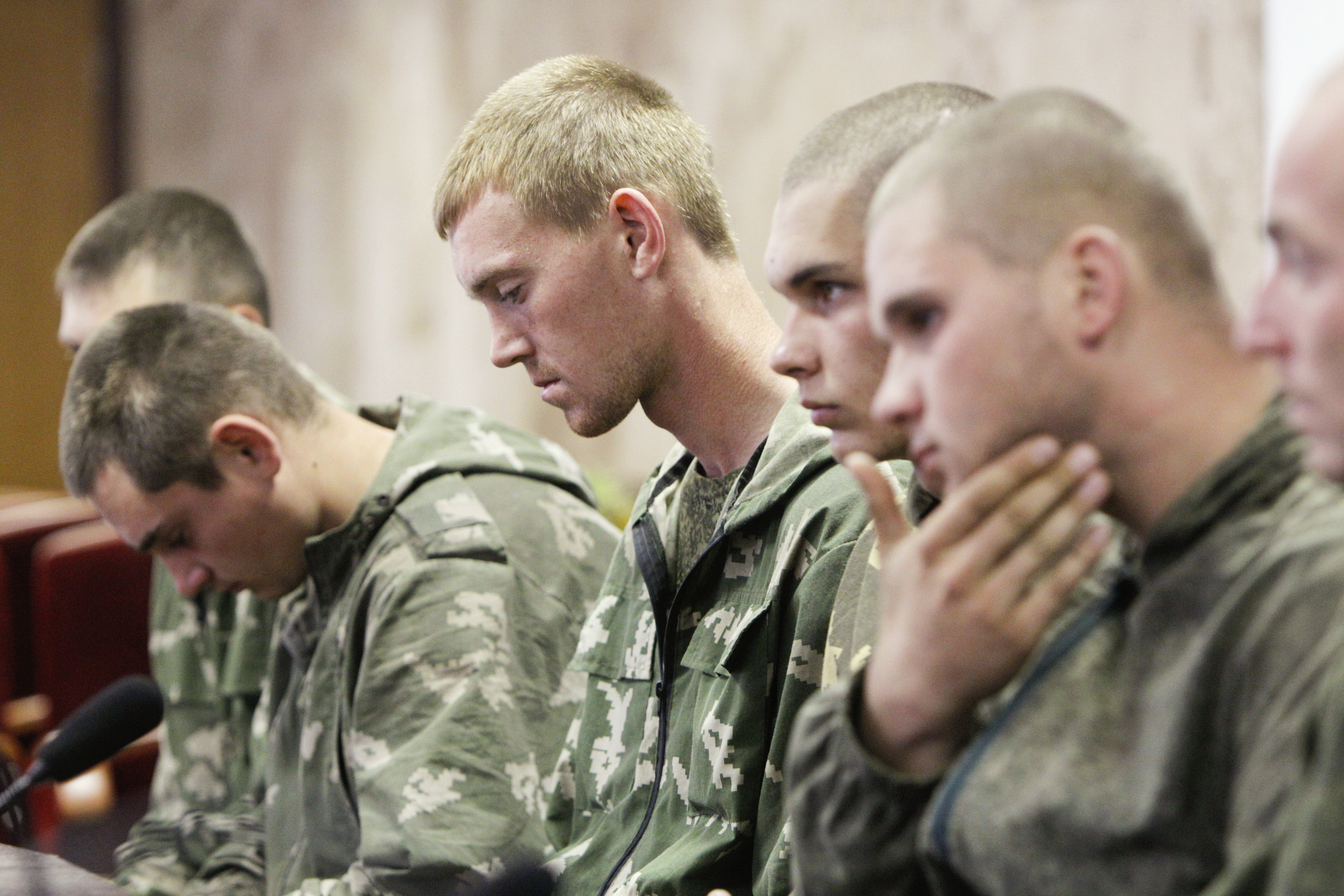 A group of Russian servicemen, taken prisoner by Ukrainian authorities, are presented at a news conference in Kiev on Aug. 27, 2014. Ukraine said on Tuesday its forces had captured a group of Russian paratroopers who had crossed into Ukrainian territory on a "special mission," but Moscow said they had ended up there by mistake (Valentyn Ogirenko—Reuters)