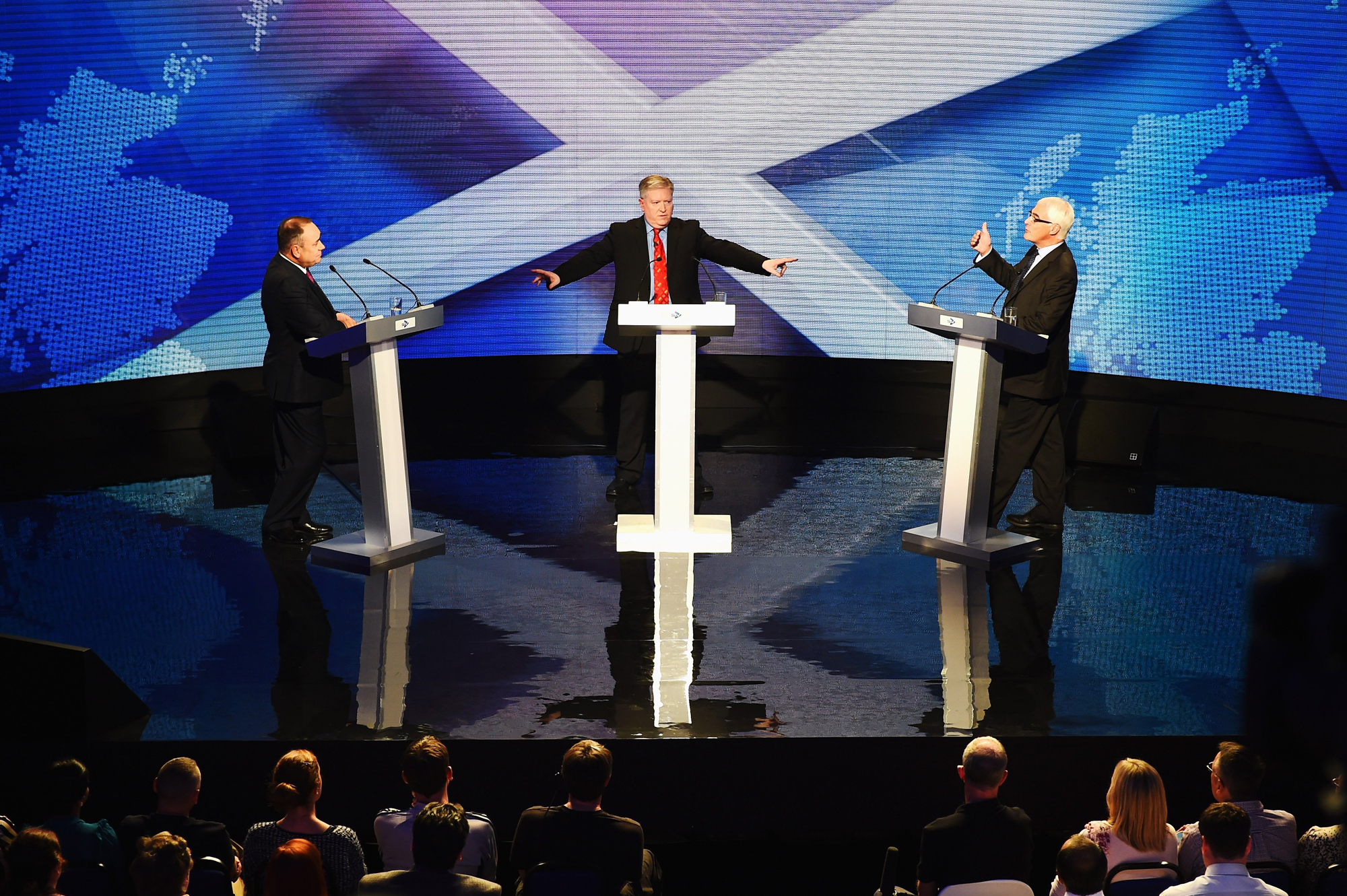 Alex Salmond, First Minister of Scotland and Alistair Darling, chairman of Better Together take part in a live television debate hosted by Bernard Ponsonby at the Royal Conservatoire of Scotland on August 5, 2014 in Glasgow, Scotland.