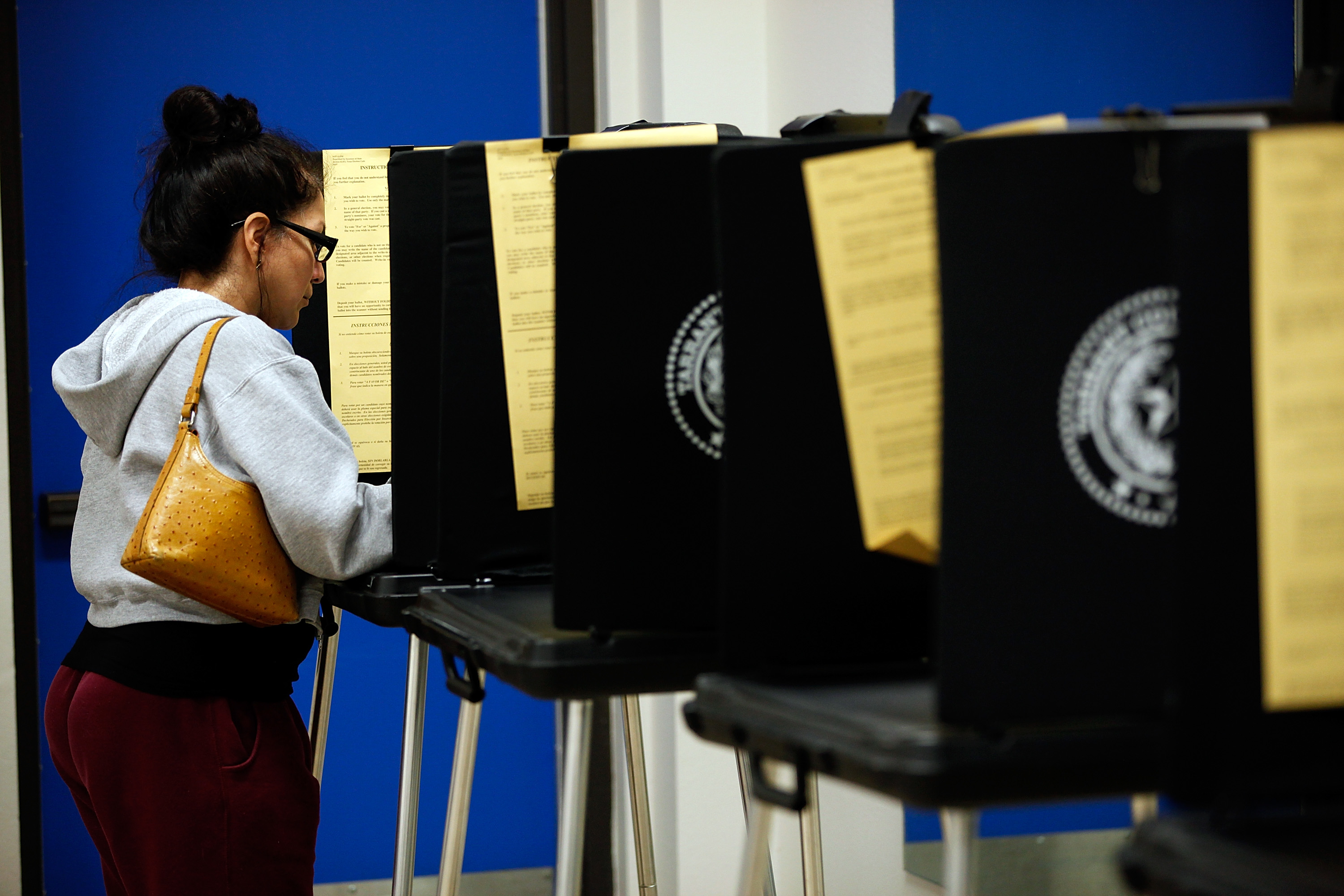 A voter completes her ballot on November 6, 2012 in Fort Worth, Texas.