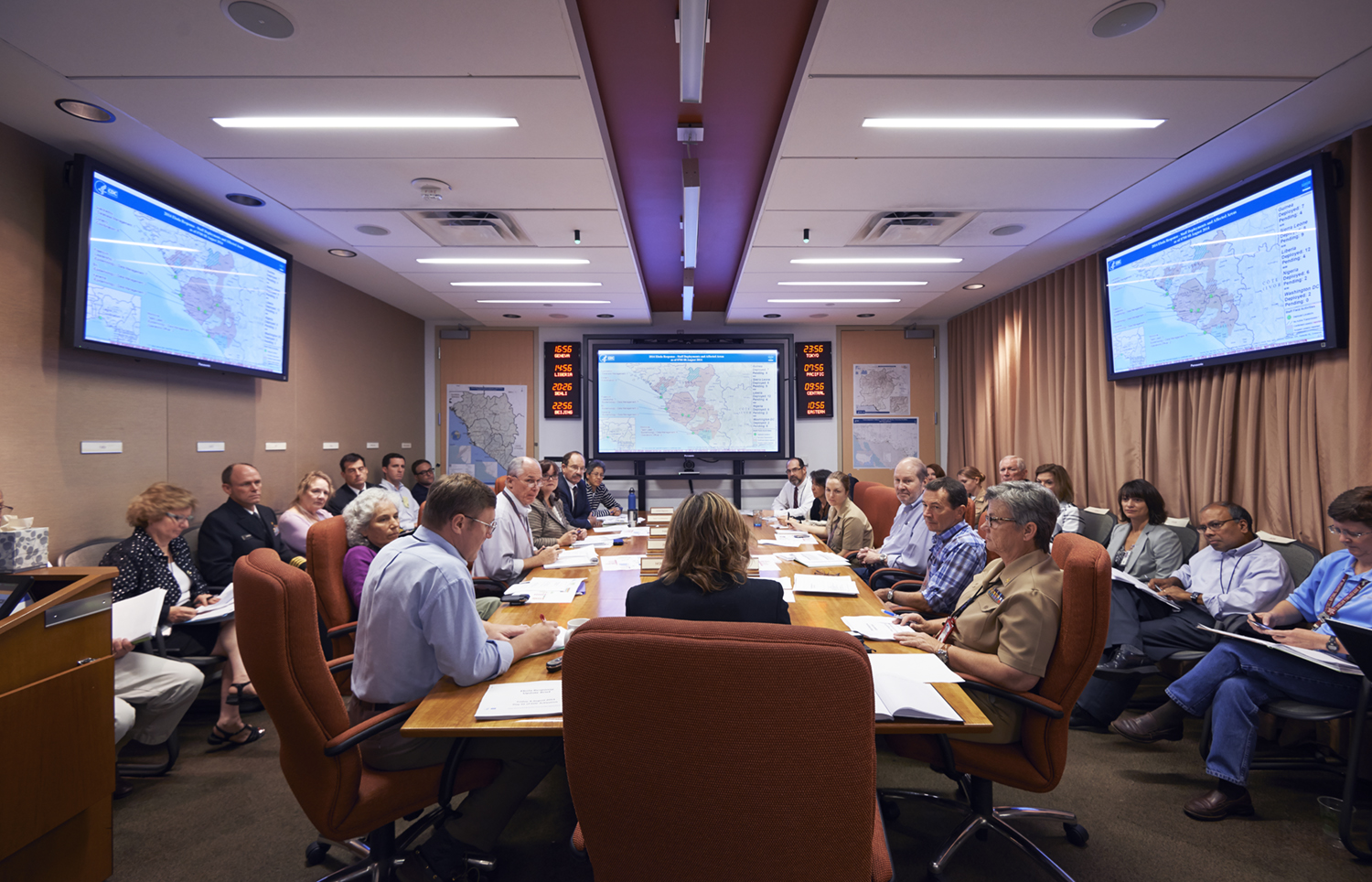 CDC leaders integral to the Ebola response, including epidemiologists, laboratorians, logistics, and more, assemble in agency’s command center to discuss next steps in directing the response at CDC Emergency operations center in Atlanta, August 8. (Spencer Lowell for TIME)