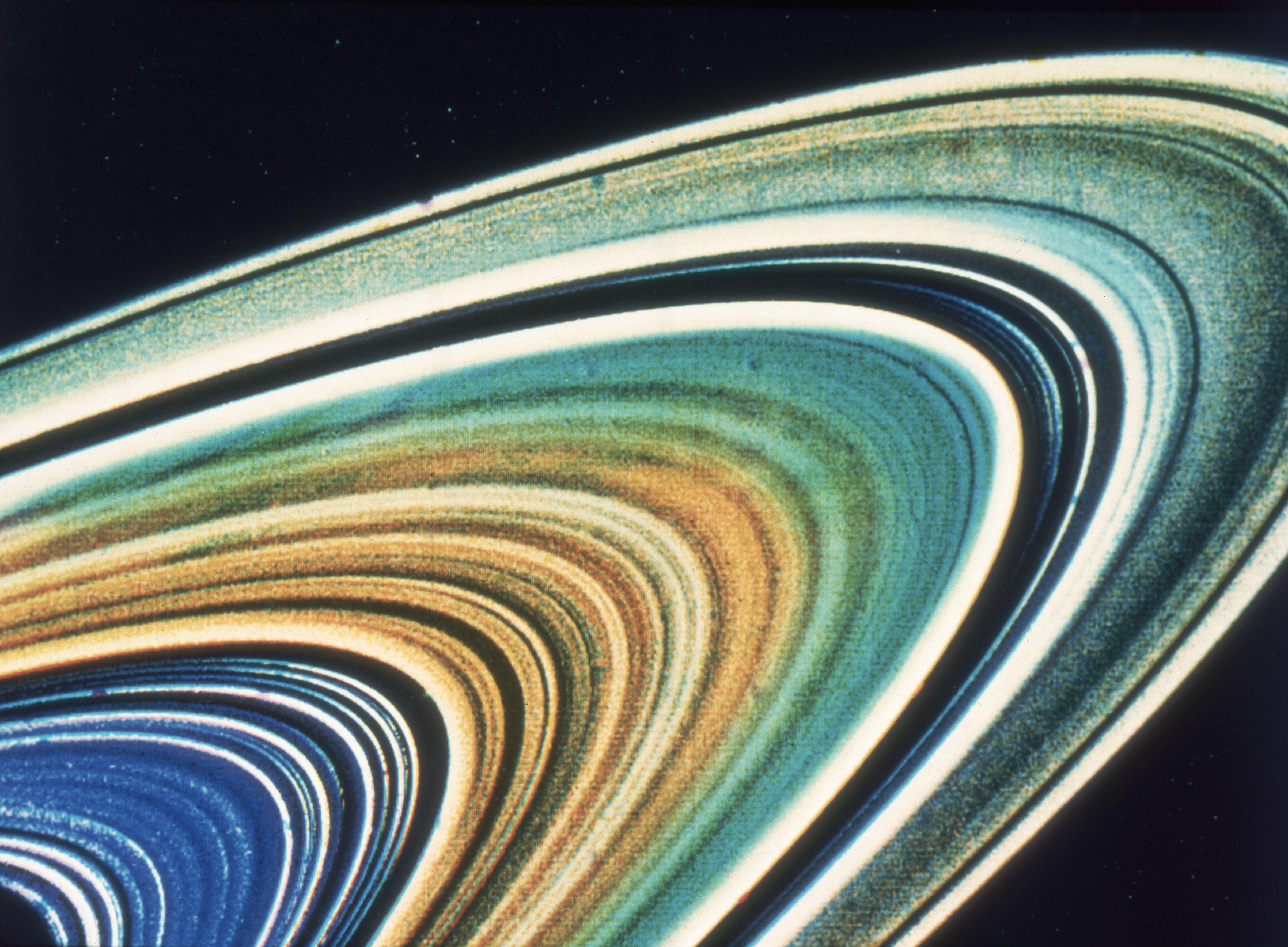 An enhanced color image of Saturn's rings taken from the Voyager 2 spacecraft on Aug. 1981.