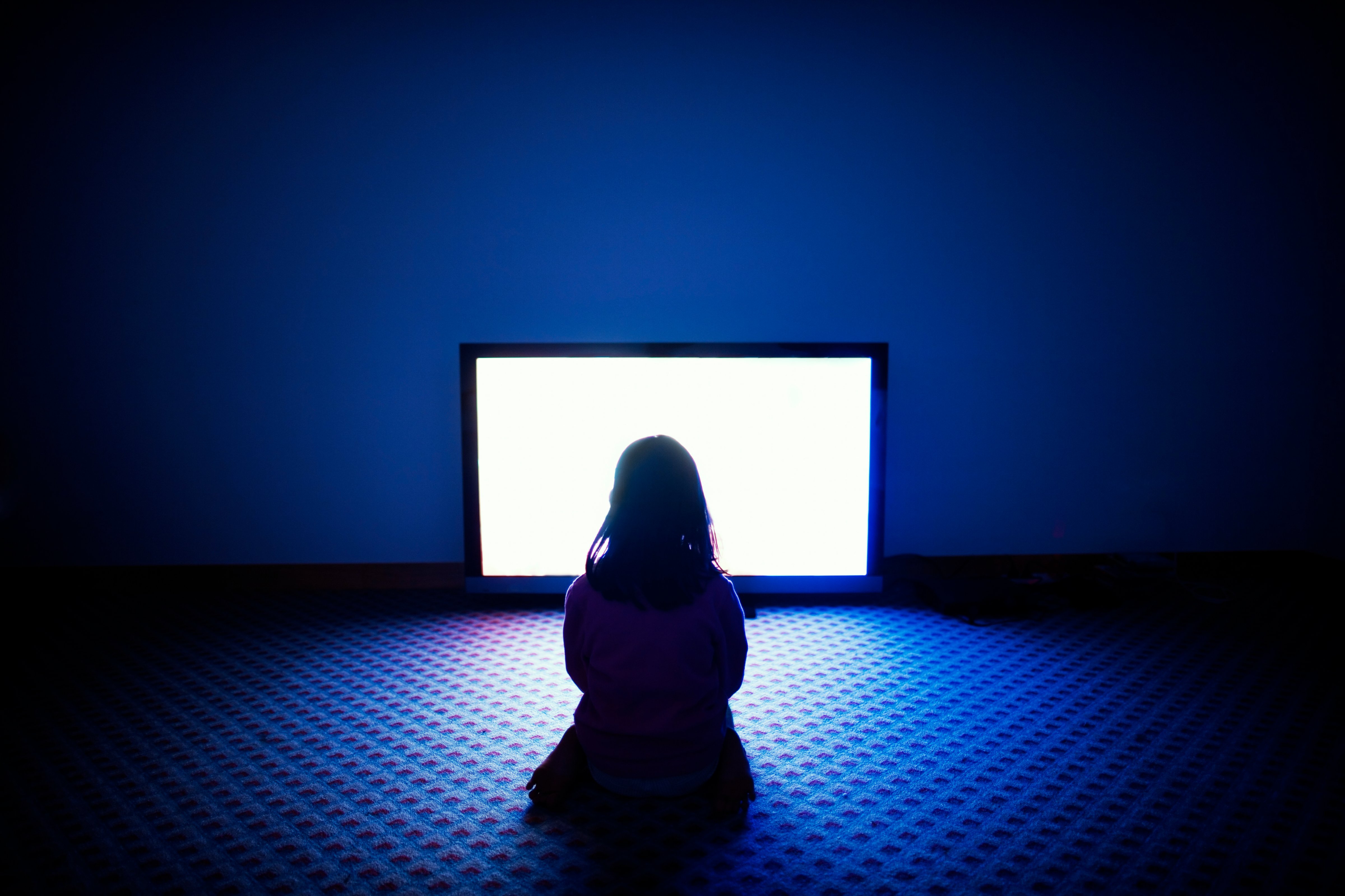 woman-watching-tv-alone