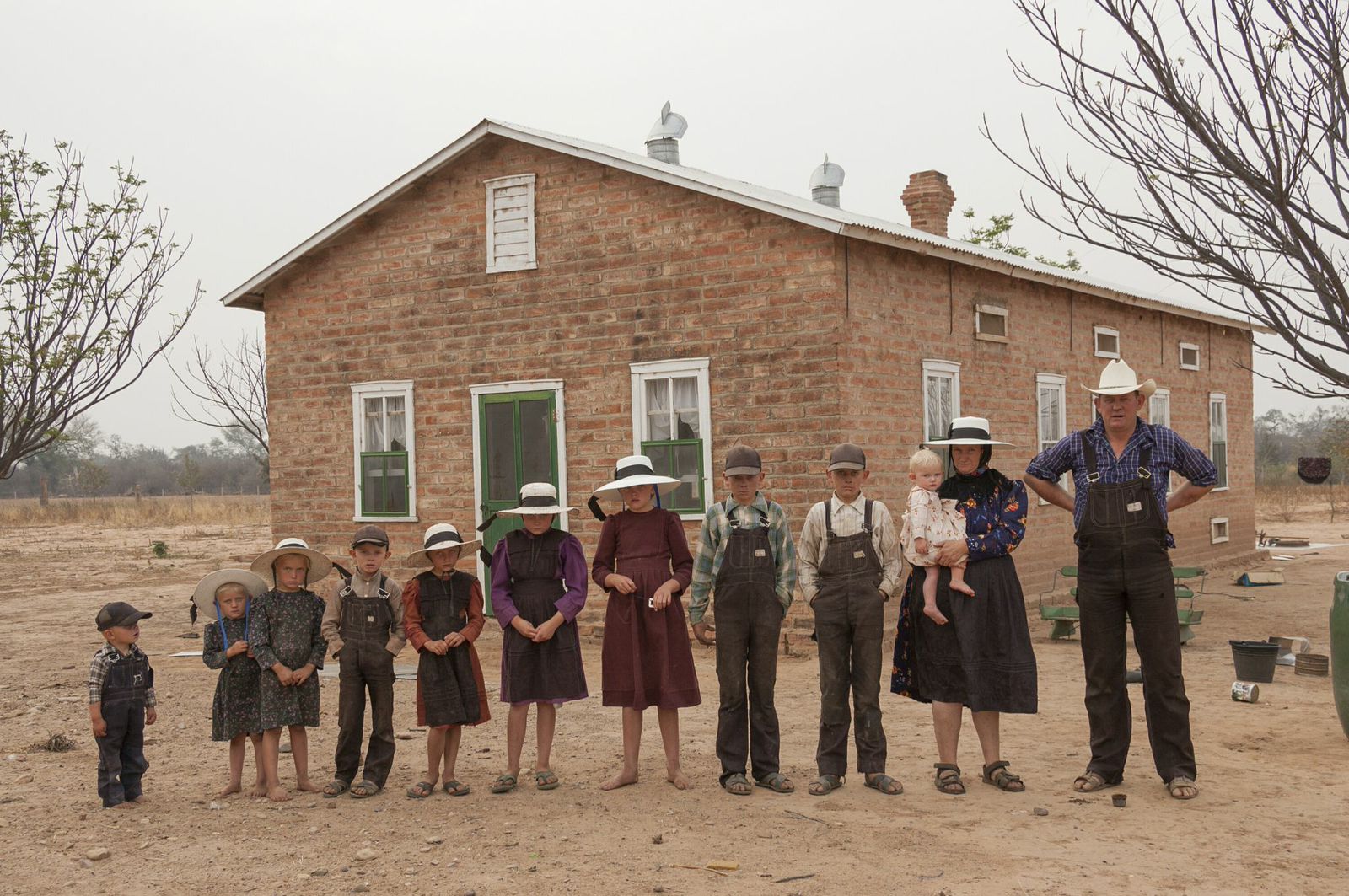 A Mennonite family are seen front of their house, Durango colony, Bolivia.