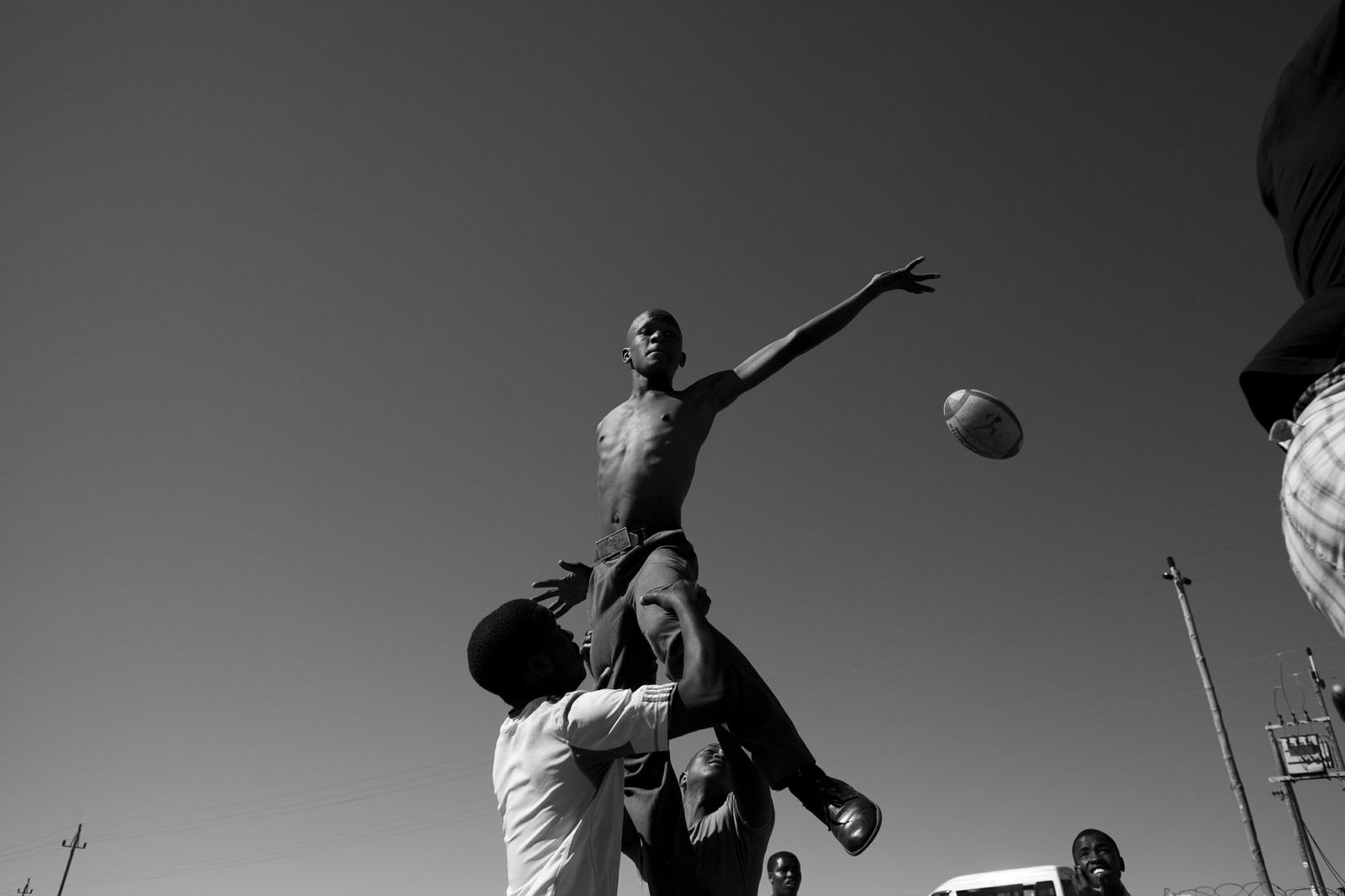 Ndumiso Gaga, 19, practices rugby with classmates at Iqhayiya Senior Secondary School, in Khayelitsha, Cape Town. “It’s hard to grow up here, because there are many things that are bad,” says Gaga.