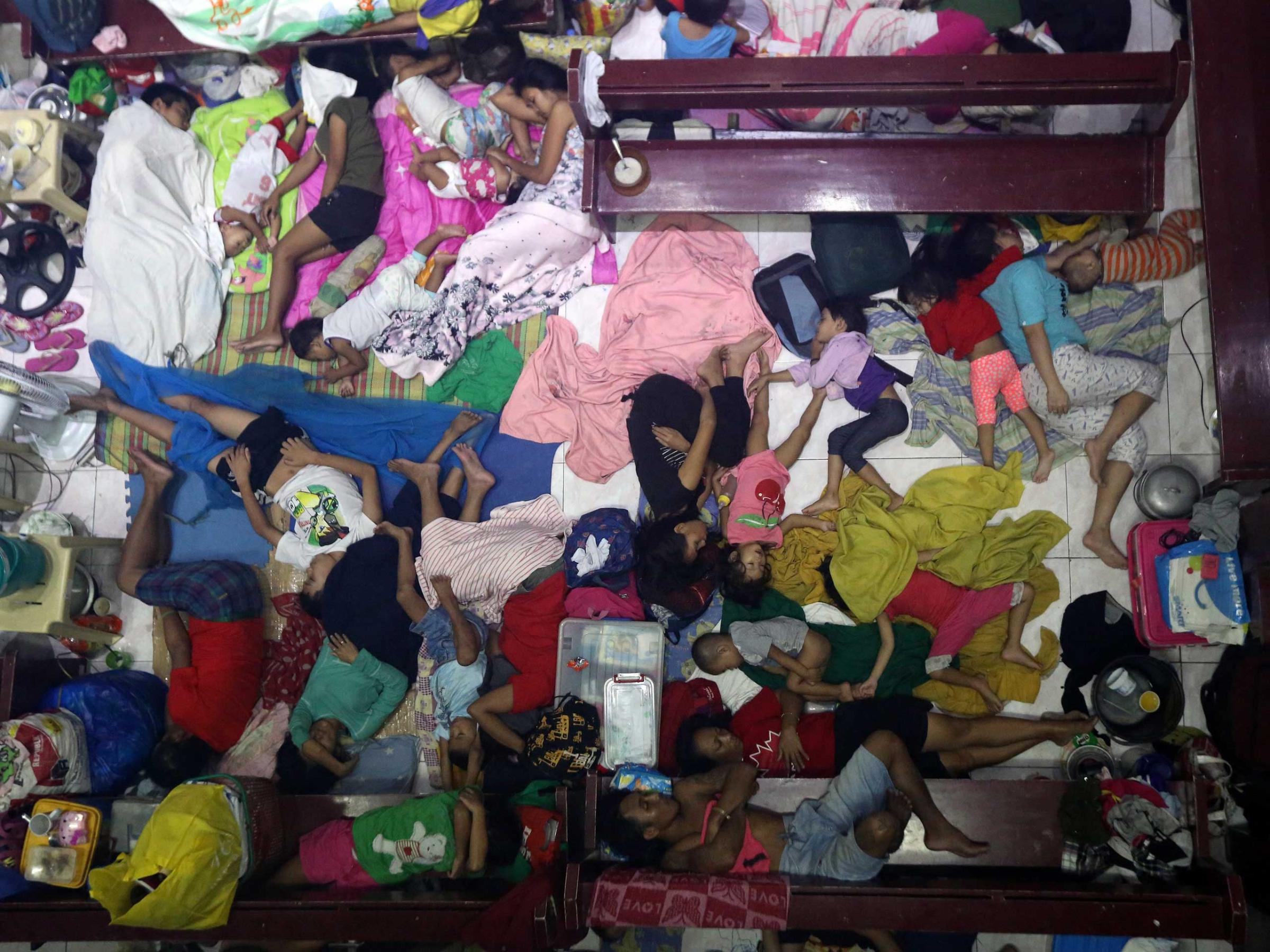 Thousands evacuated in Philippine floods.