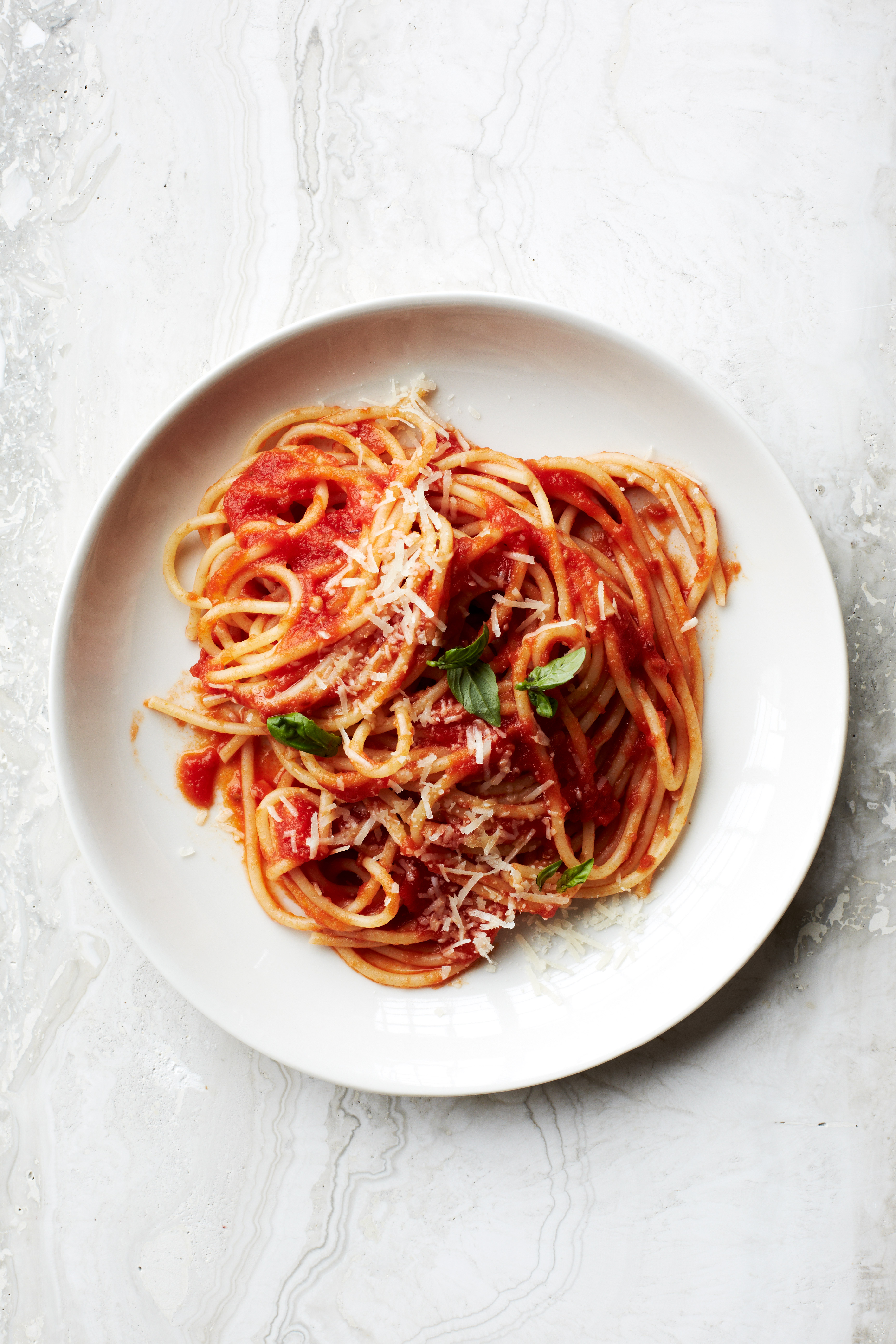Sauce-Simmered Spaghetti al Pomodoro
                              Top Chef finalist Sarah Grueneberg cooks parboiled spaghetti right in the tomato sauce so it becomes infused with flavor.
                              Recipe