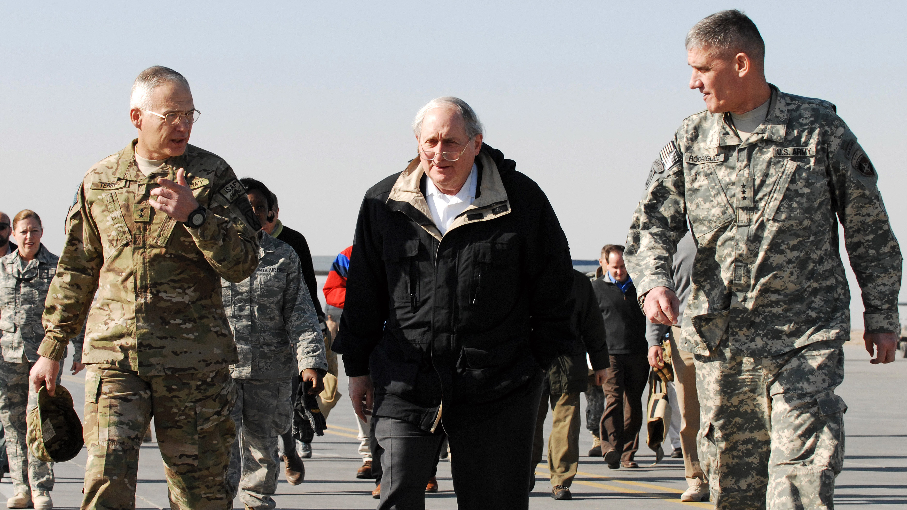 Carl Levin, center, on a 2011 visit to Afghanistan. (U.S. Navy / Getty Images)