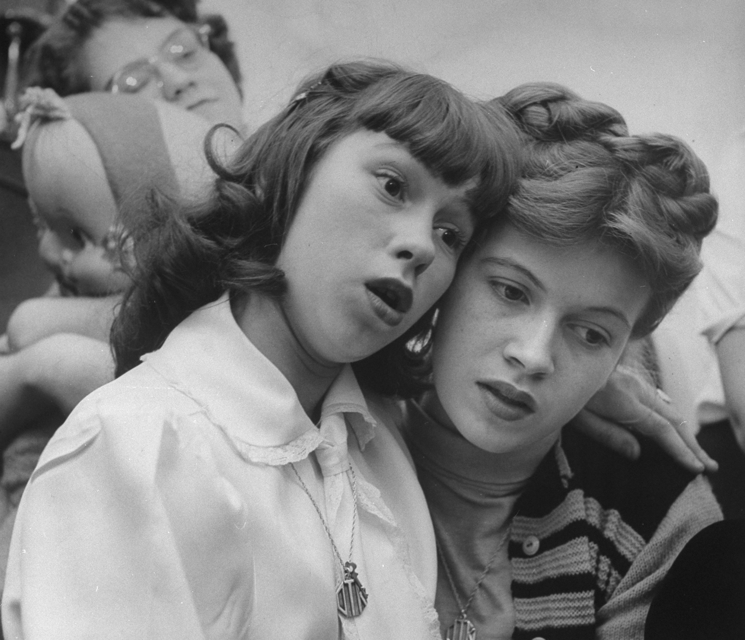 Two Cleveland high schoolers at a record-playing meeting of a Frankie Laine fan club, 1948.