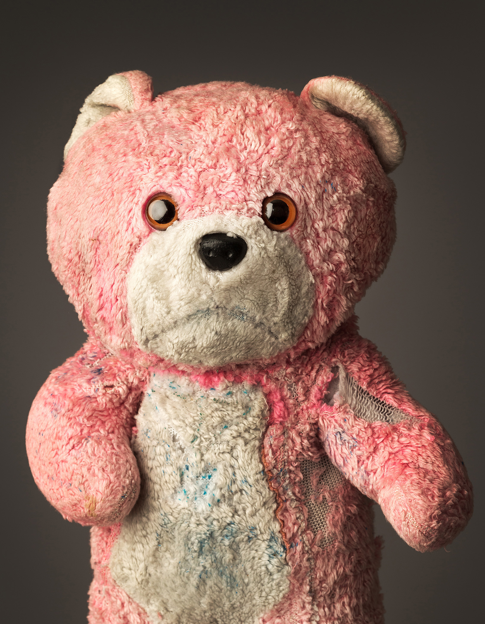 Well-worn pink teddy bear