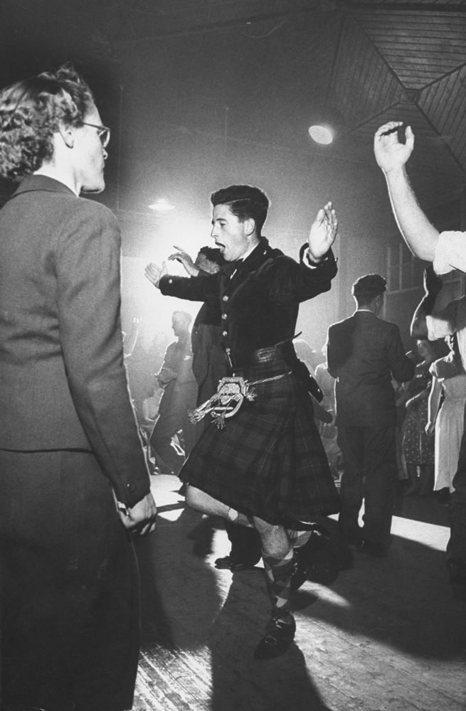 The future chief of the MacLeod Clan, John MacLeod, dances at his coming of age party, 1956.