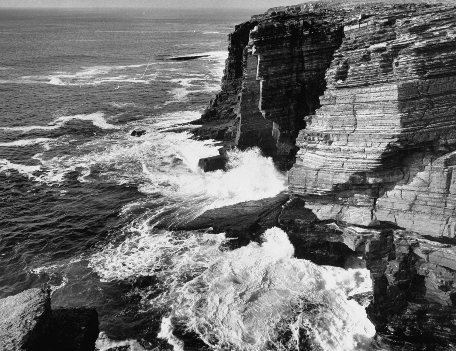 High rock cliffs in the Orkney Islands, 1952.