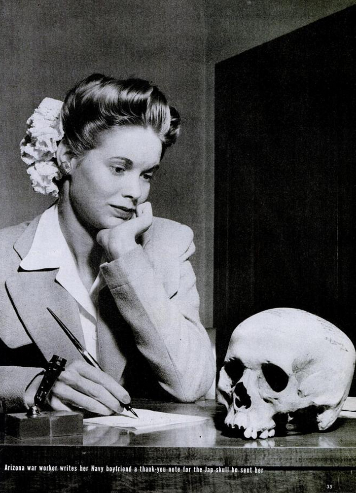 Natalie Nickerson, 20, gazes at a skull -- reportedly of a Japanese soldier -- sent to her from New Guinea by her boyfriend serving in the Pacific.
