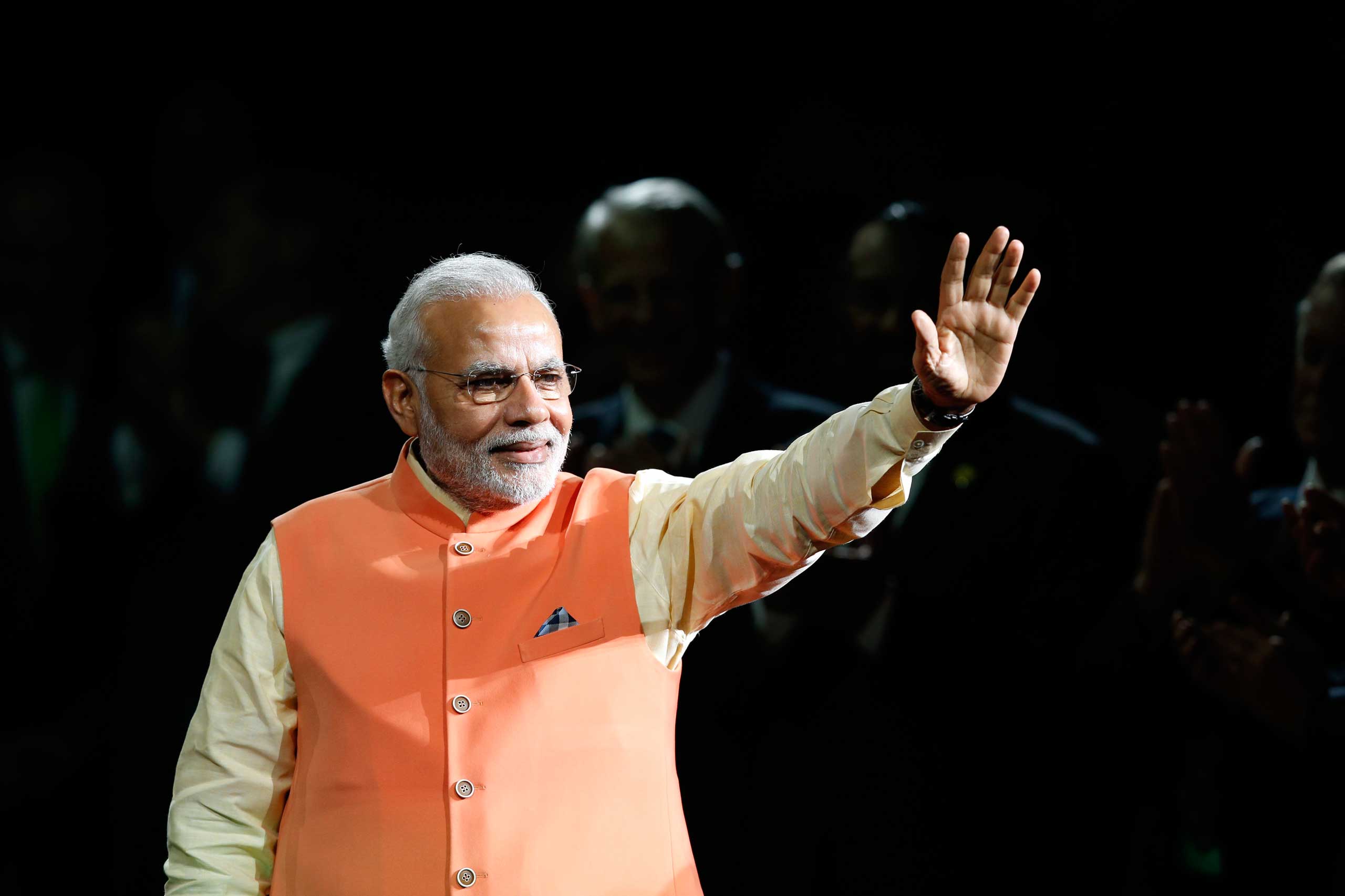 Prime Minister Narendra Modi of India waves to the crowd as he arrives to give a speech during a reception by the Indian community in honor of his visit to the United States at Madison Square Garden, Sept. 28, 2014, in New York. (Jason DeCrow—AP)