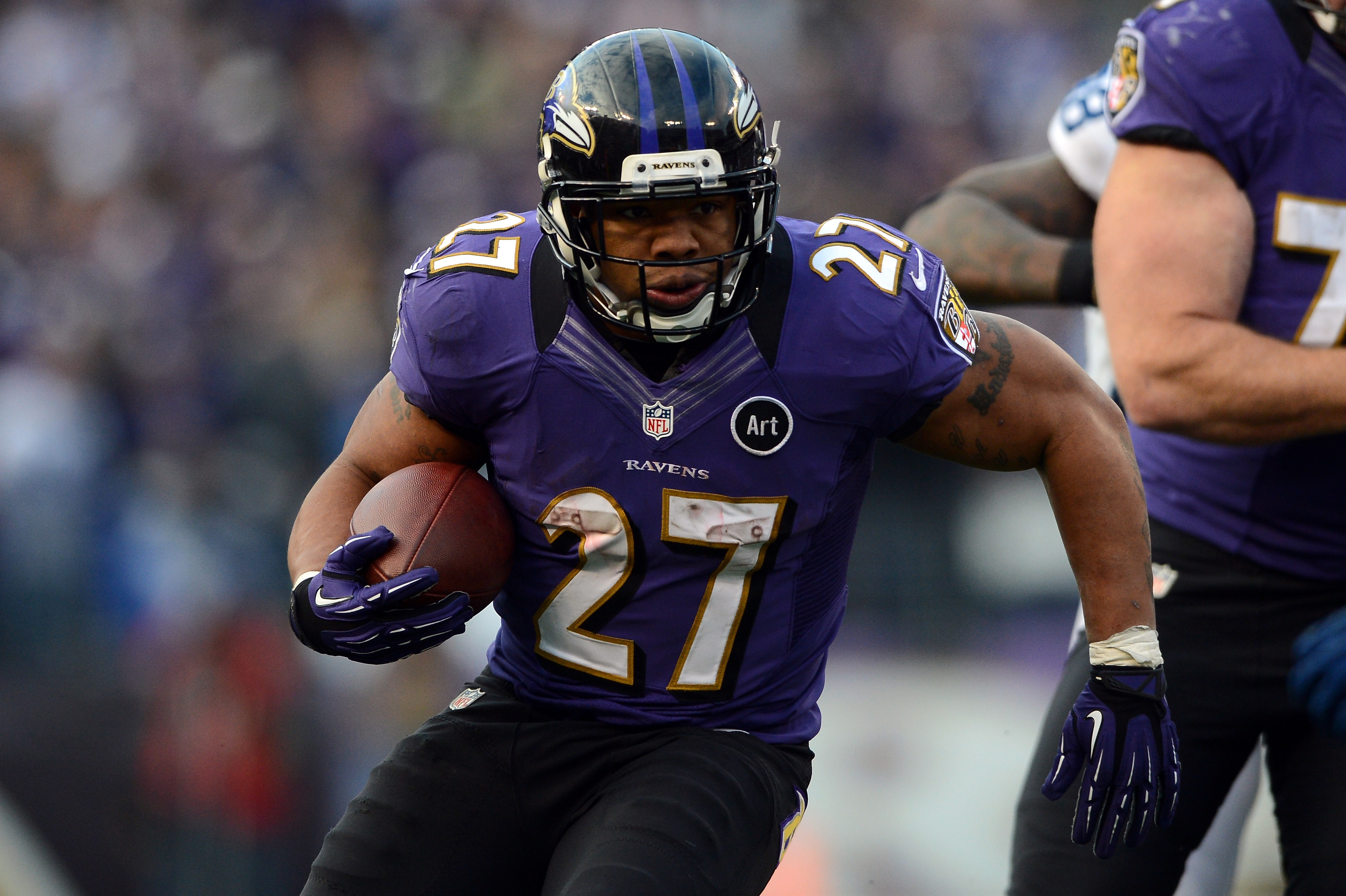 Ray Rice #27 of the Baltimore Ravens runs the ball during the AFC Wild Card Playoff Game on January 6, 2013 in Baltimore, Maryland. (Patrick Smith&mdash;Getty Images)