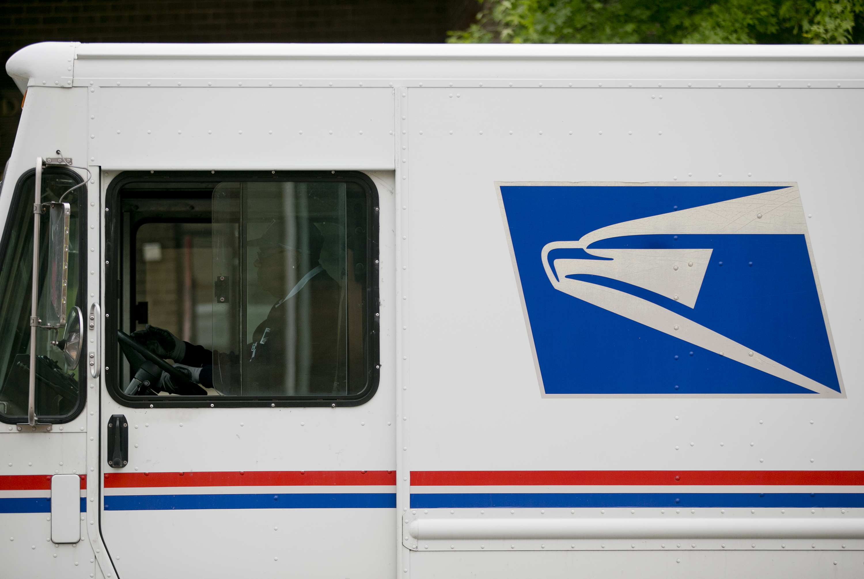 The U.S. Postal Service (USPS) logo is seen on the side of a delivery truck in Washington, D.C., U.S., on Thursday, May 9, 2013. (Bloomberg&mdash;Bloomberg via Getty Images)
